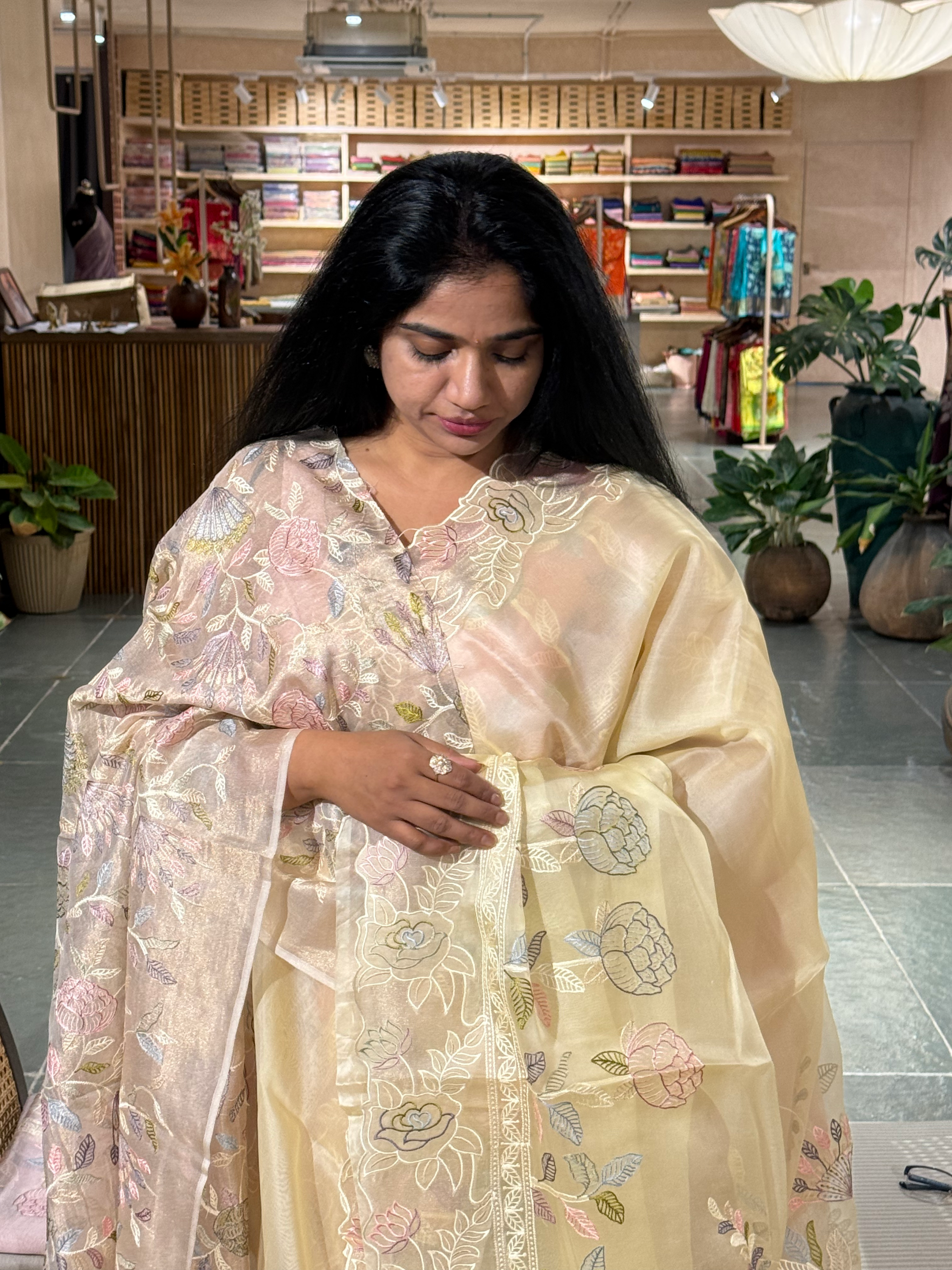 Pastel Yellow Pure Organza Saree with embroidered and cutwork borders
