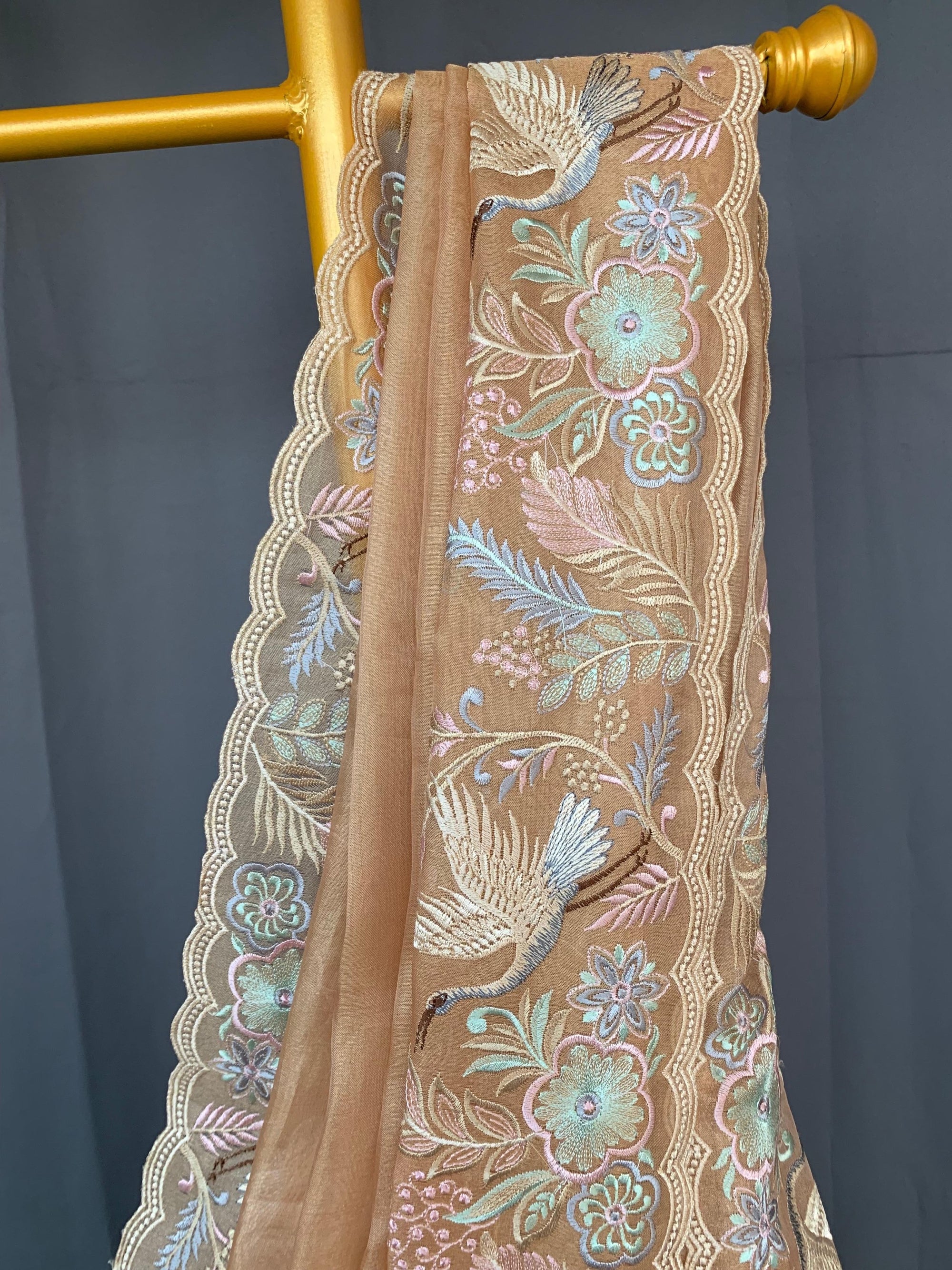 Light Peach  kora Tissue Designer Saree with heavy embroidered Borders .
