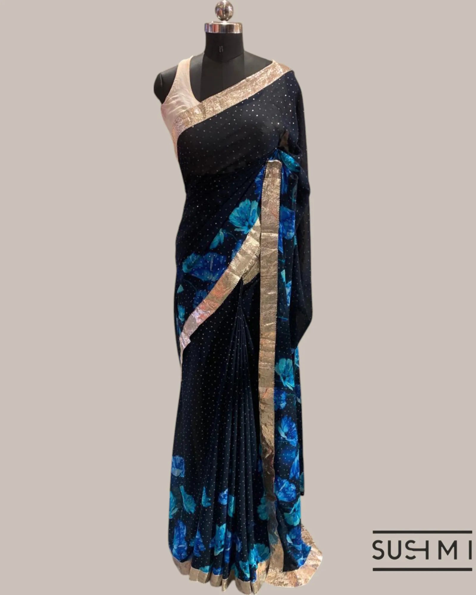 Pure Gorgette Saree with floral printed border and pallu hemlined with gota lace