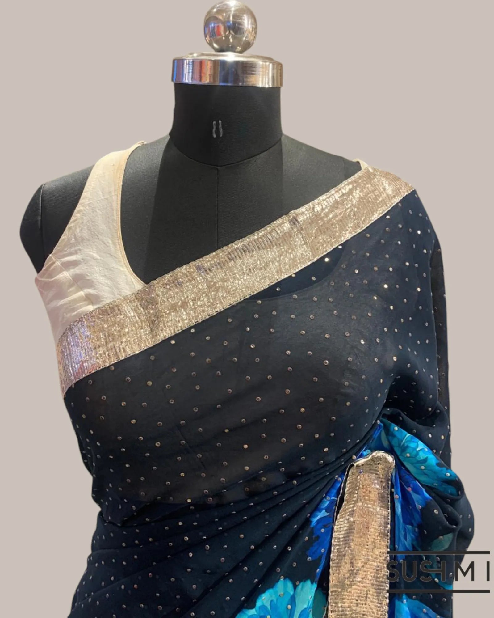 Pure Gorgette Saree with floral printed border and pallu hemlined with gota lace