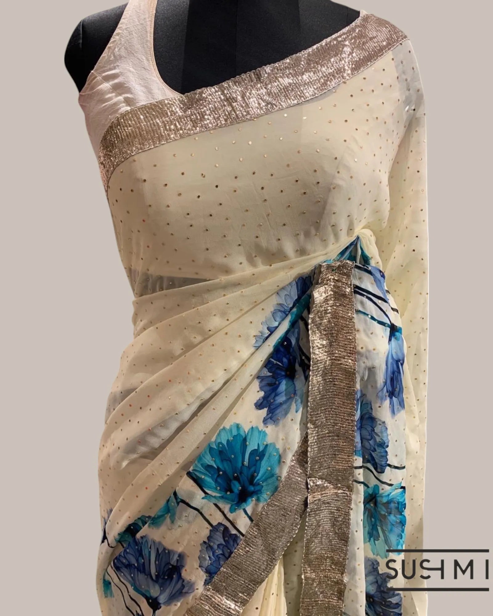 Pure Gorgette Saree with floral printed border and pallu hemlined with gota lace