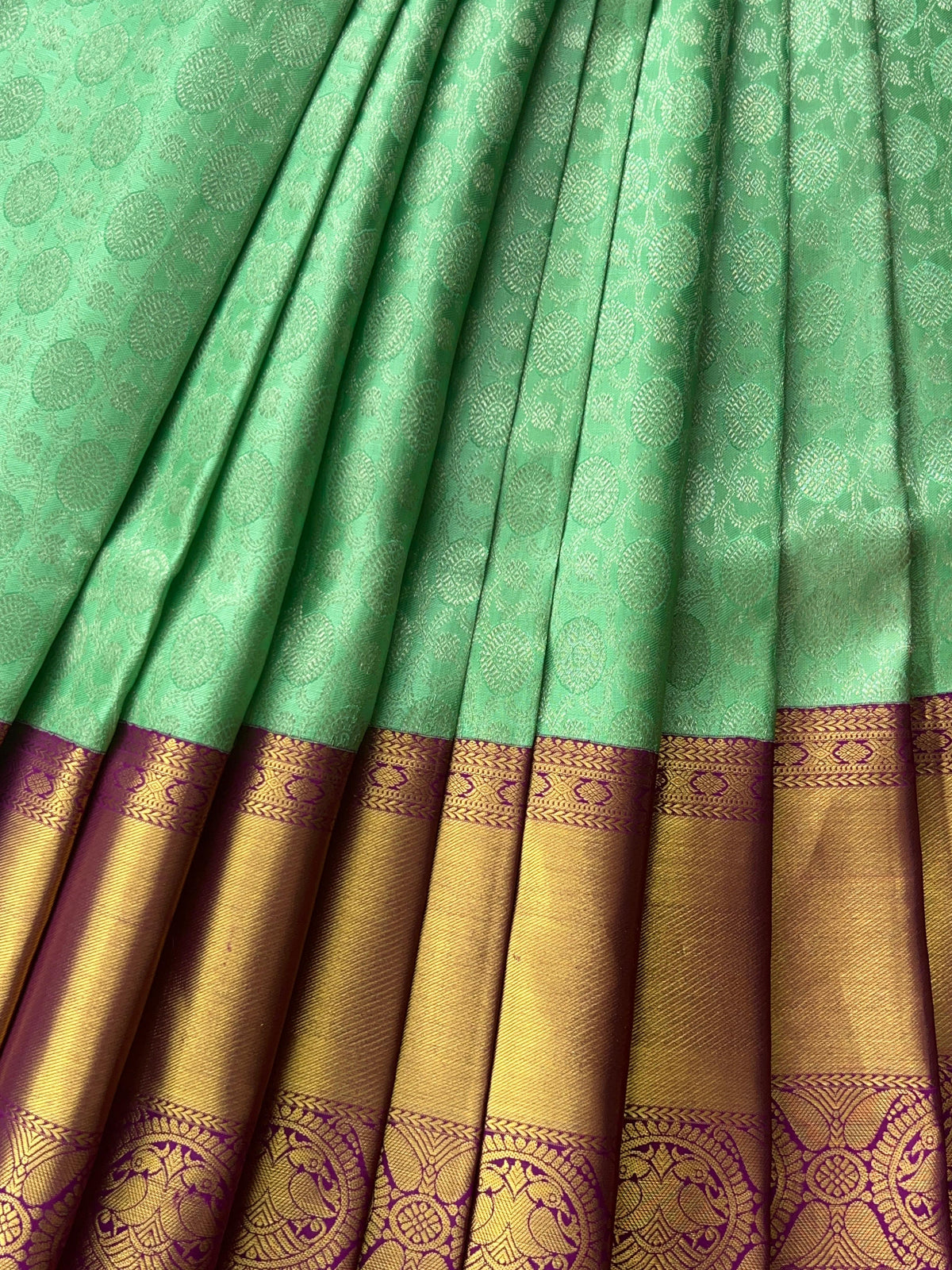 Mint Green Kanchi Pattu Brocade Saree with Rich Purple Zari Border & Pallu