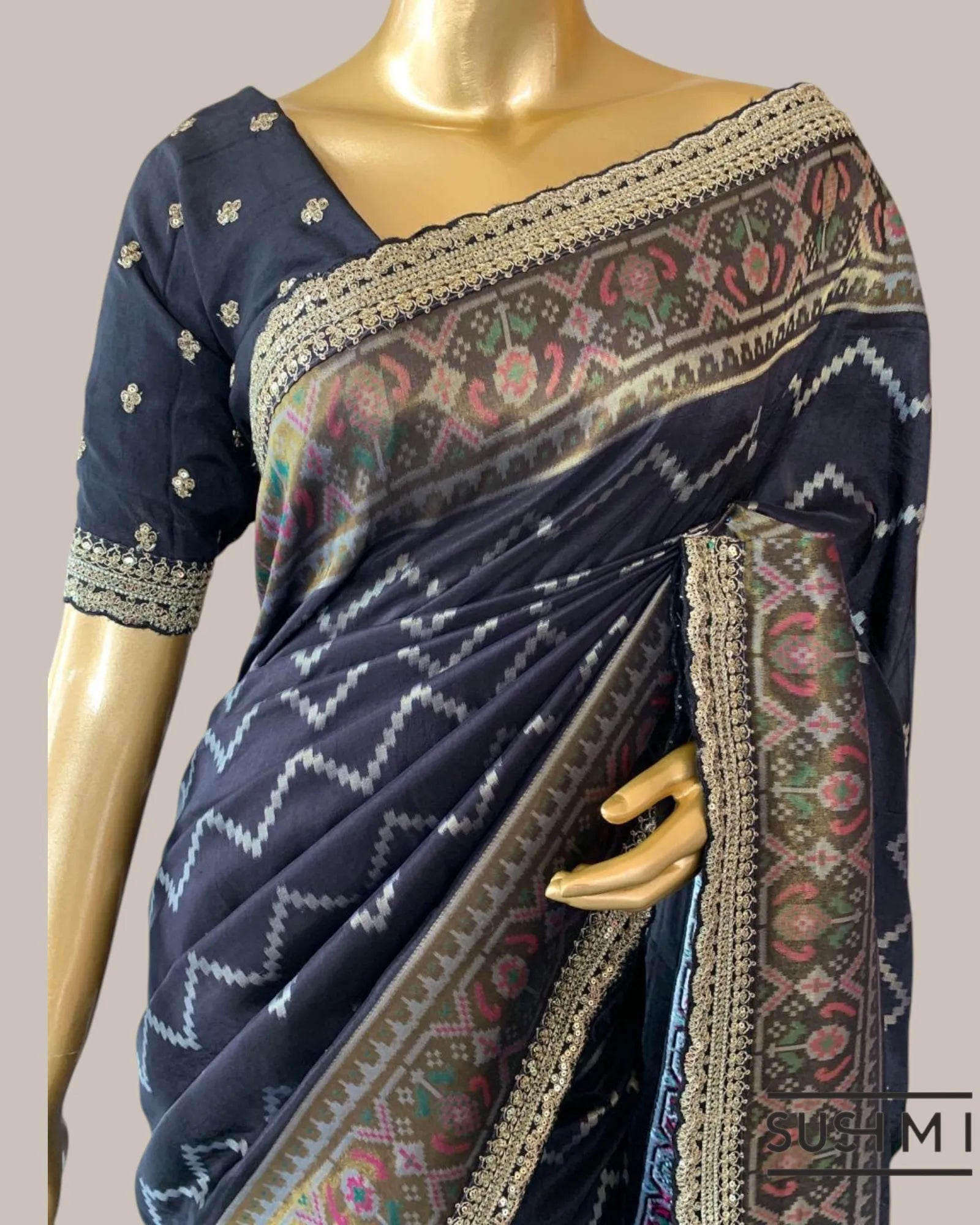 Black Falling Tussar Silk Gorgette Saree in Ikkath Patola style Chevron body and