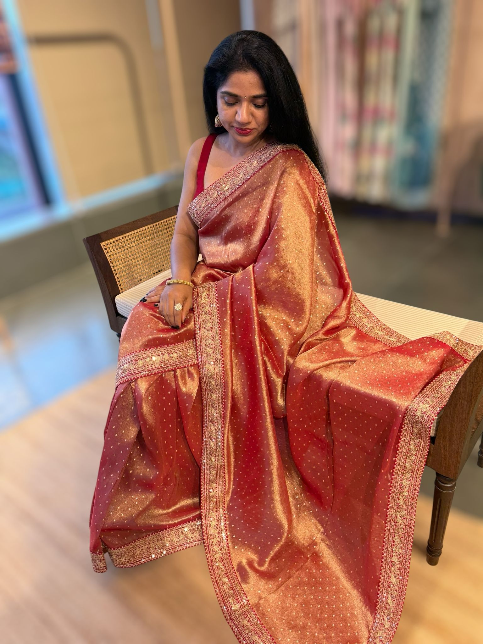 Red Tissue Gorgette saree witj sabyasachi borders and allover pitawork blouse