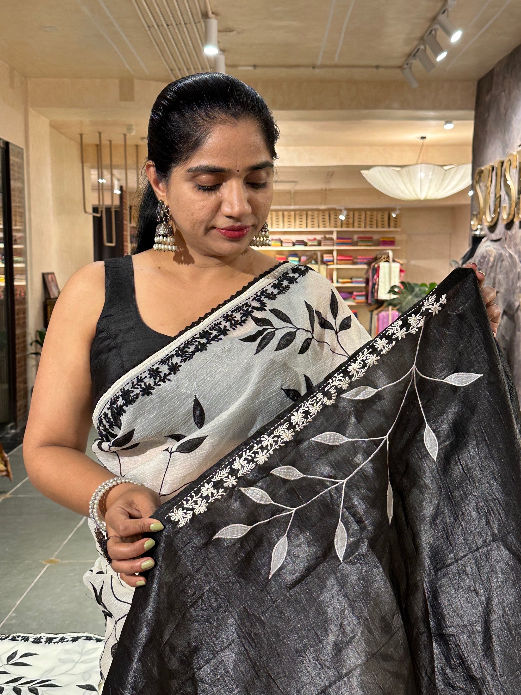 Half white crush Saree with allover applique work in leaf creeper pattern  and h