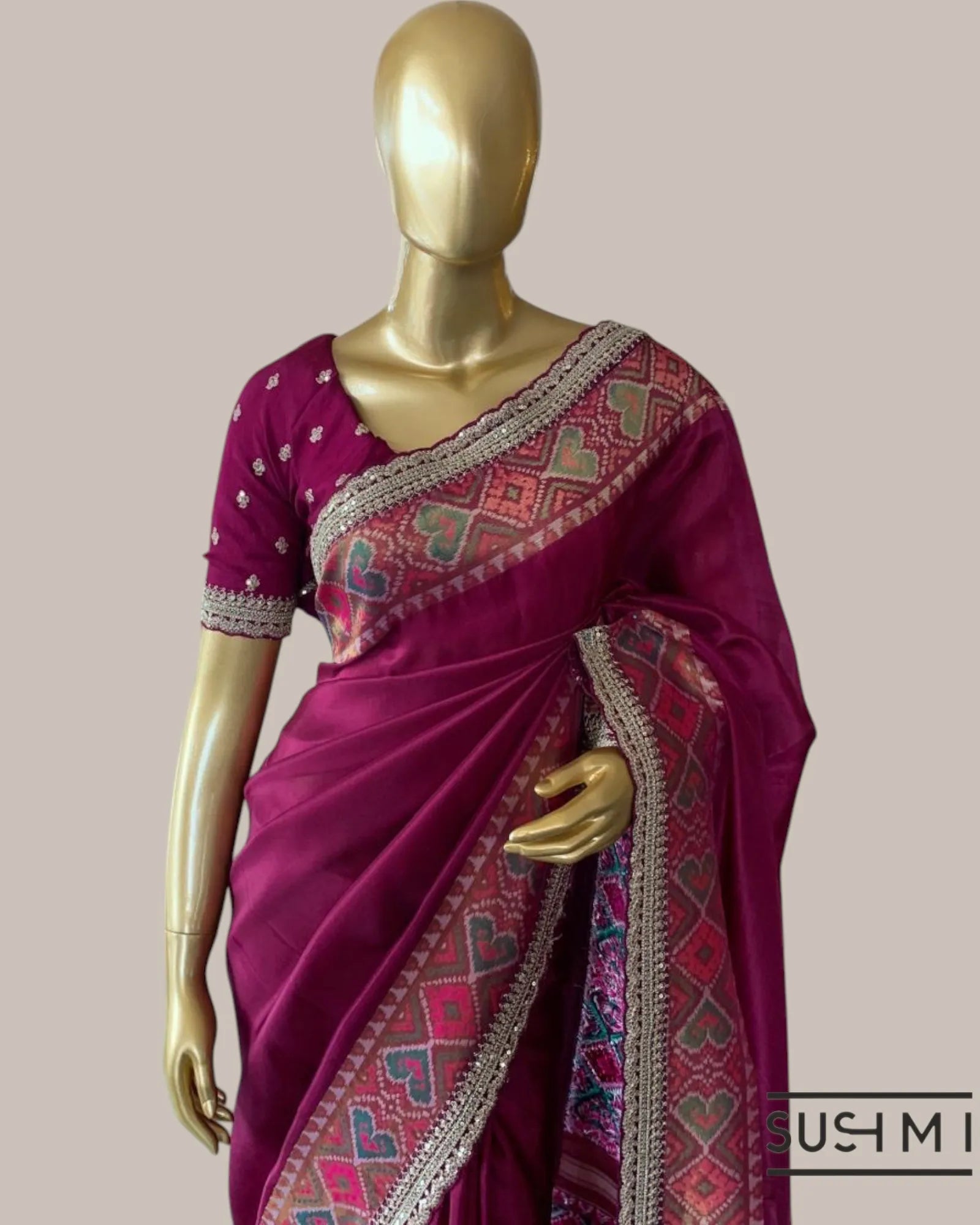 Beetroot Pink Tussar Silk Gorgette Saree in Ikkath Patola style Chevron body and