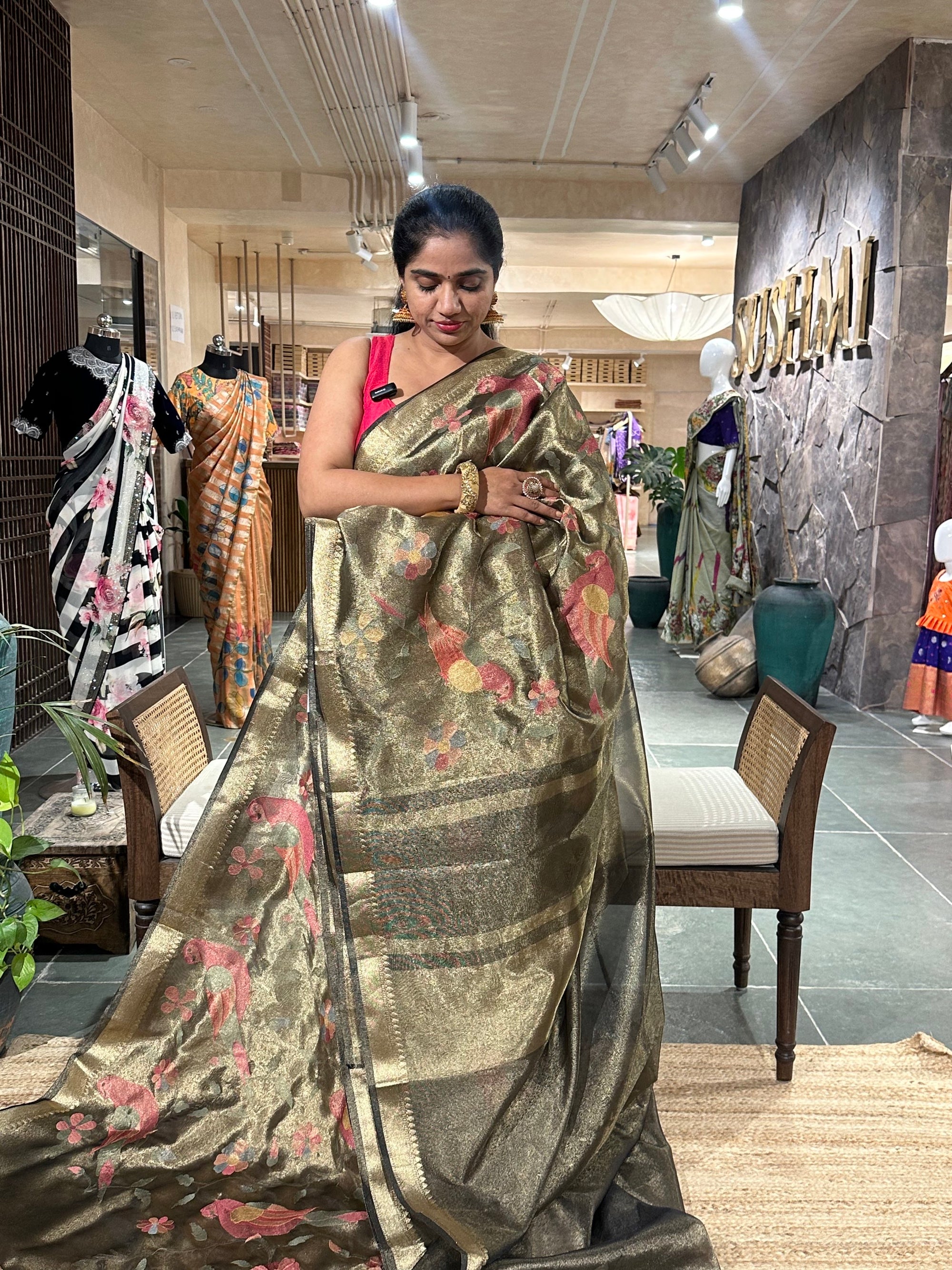 Banarasi tissue saree with pythani inspired parrot and floral embroidery