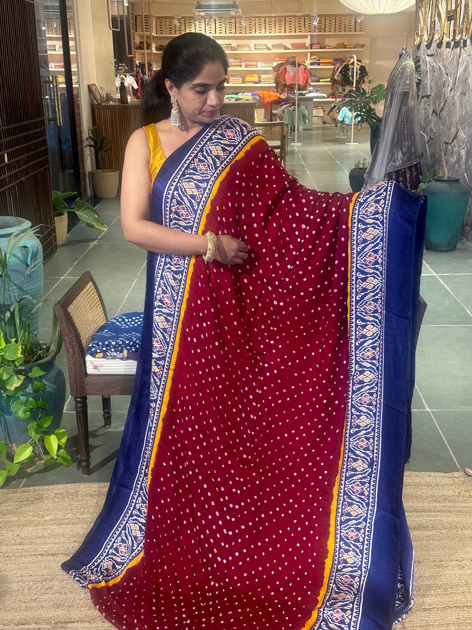 Modal satin Bandhej saree with patola printed border and pallu