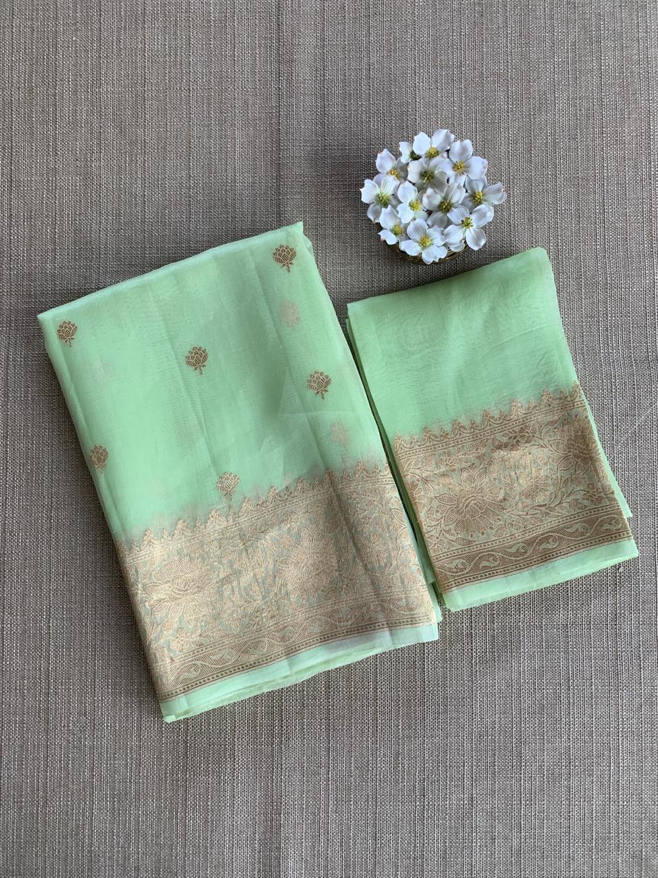 Light Apple Green Kora Banarasi Handloom Saree With Kaduwa Woven Motifs