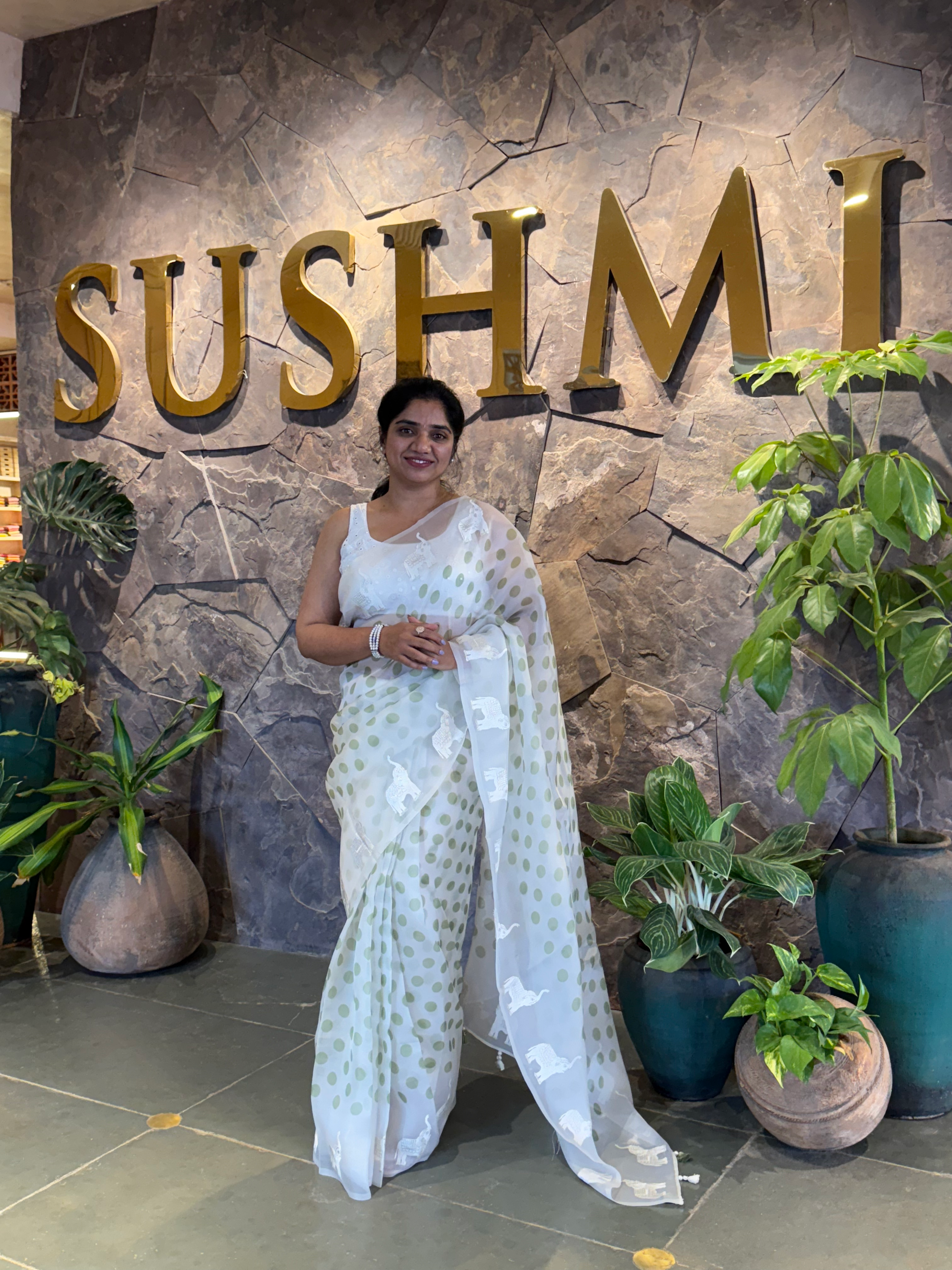 SOCH1304 :White & Green Organza Saree Wth Embroidered ElephantBorder & Floral BP