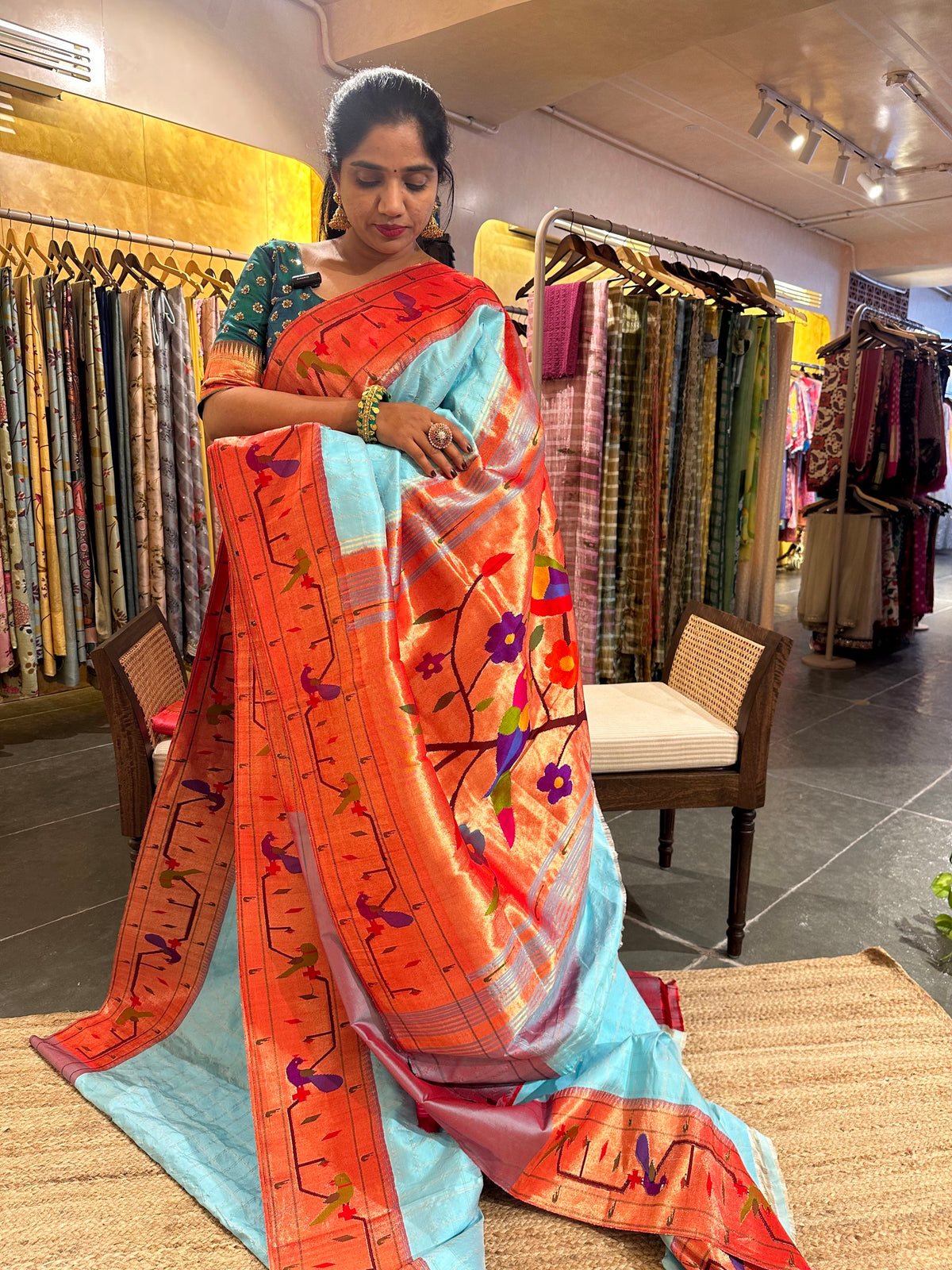 Sky blue checks Pure Pythani saree with parrot peacock border