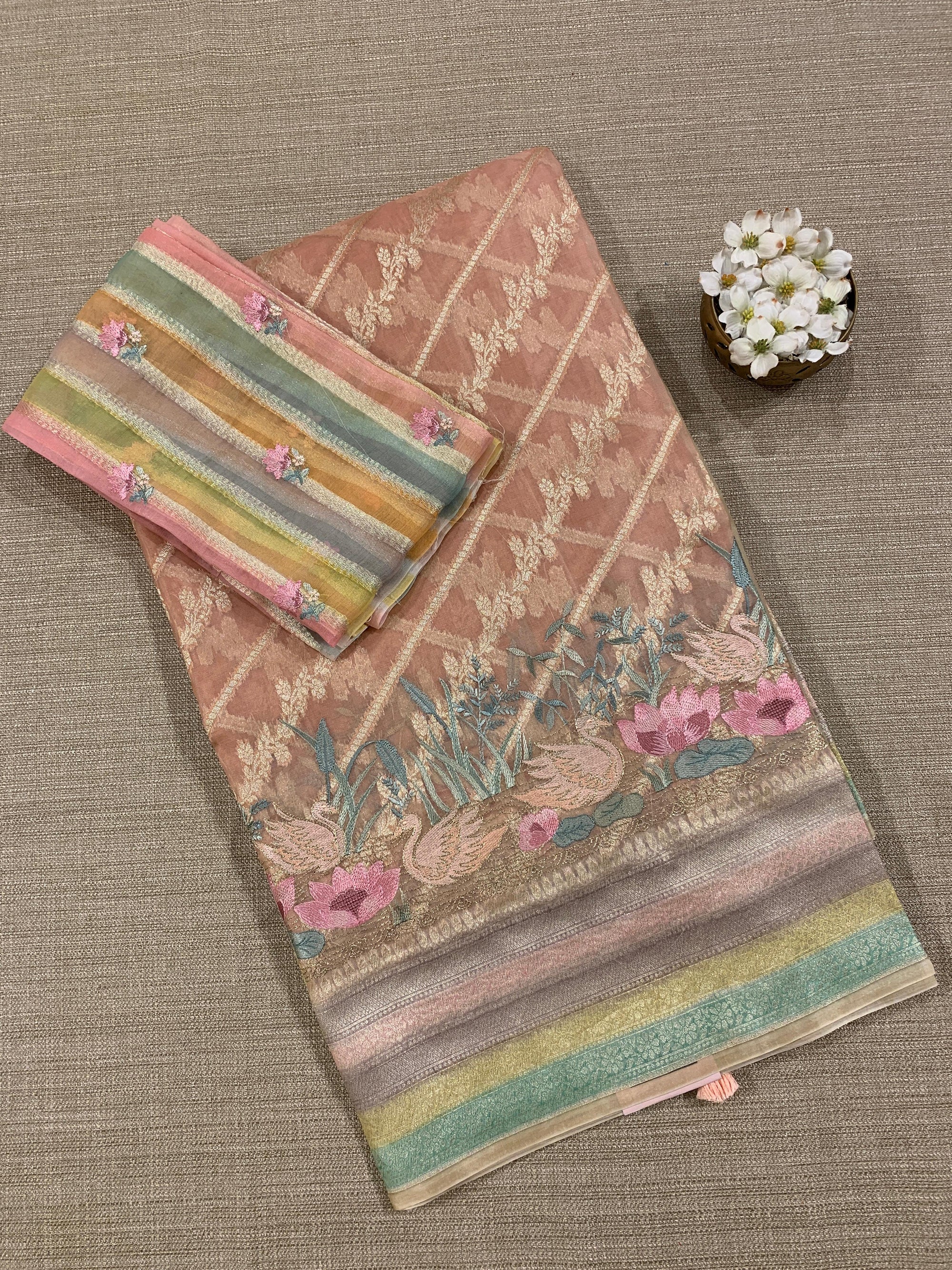 Pure Handloom Kora Banarasi with rangkaat and embroidered borders and blouse.