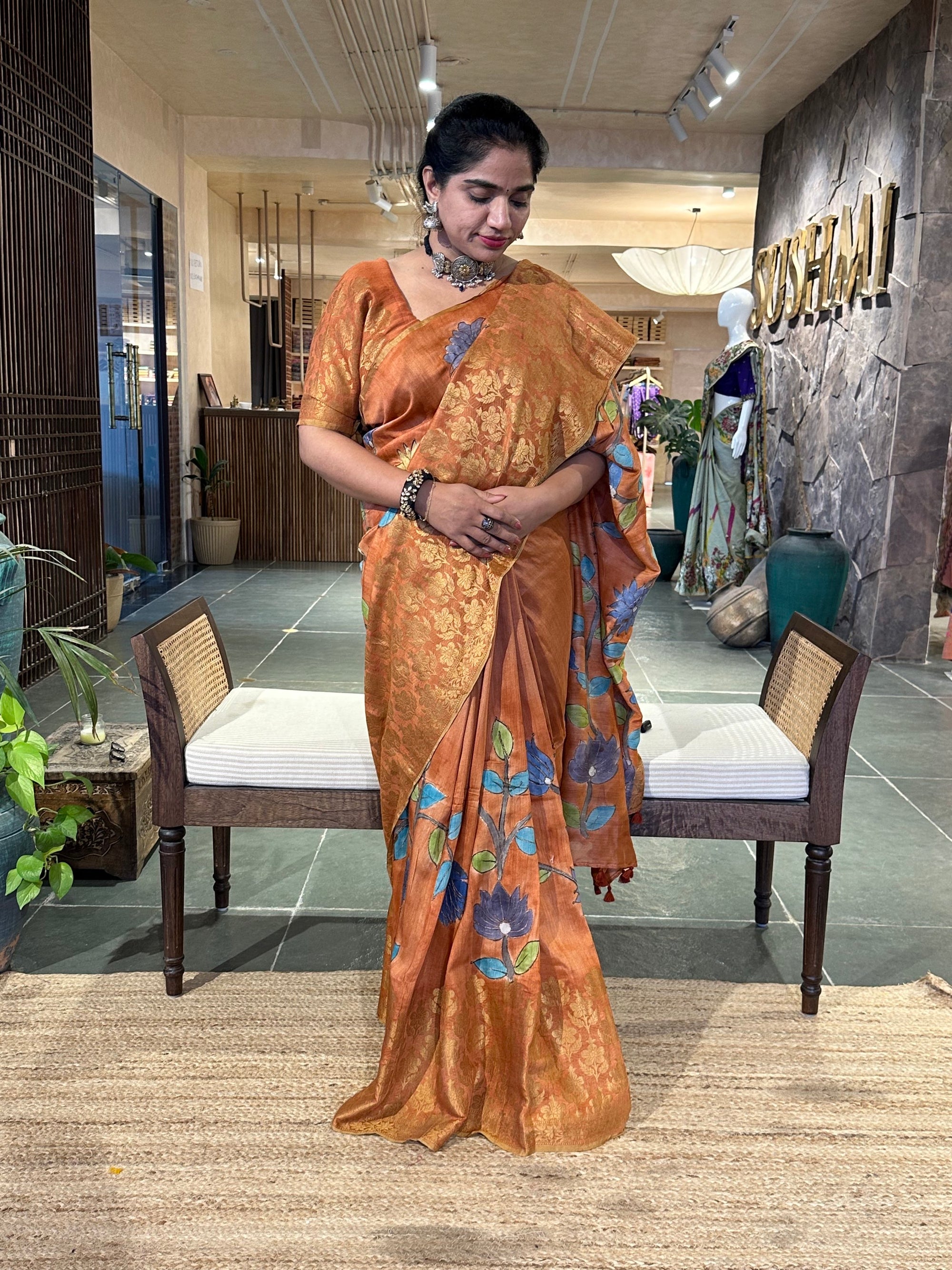 Rust Orange Pure Handloom Munga Banarasi Saree with pichwai handpainting .