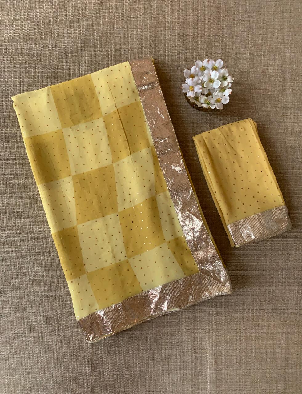 Pure Gorgette Saree in Checks Pattern , Allover Seuence & Hemlined Wth Gota lace