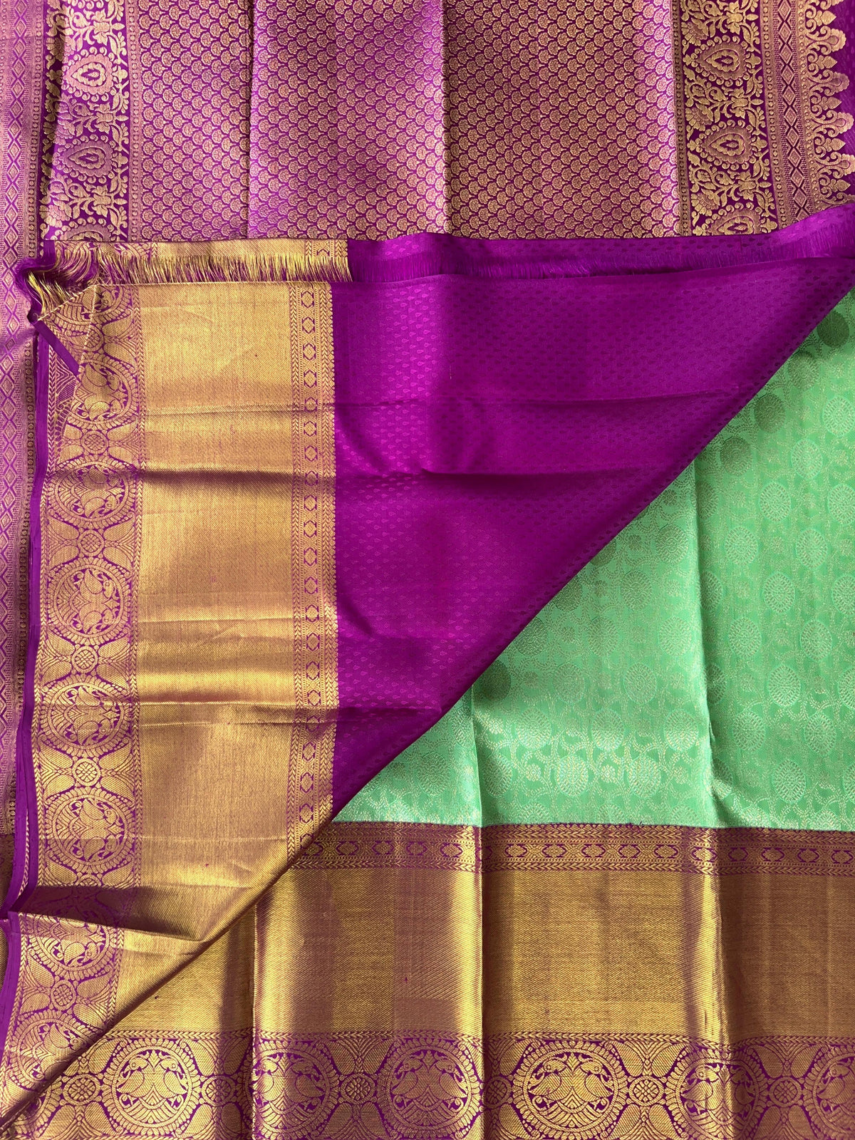 Mint Green Kanchi Pattu Brocade Saree with Rich Purple Zari Border & Pallu