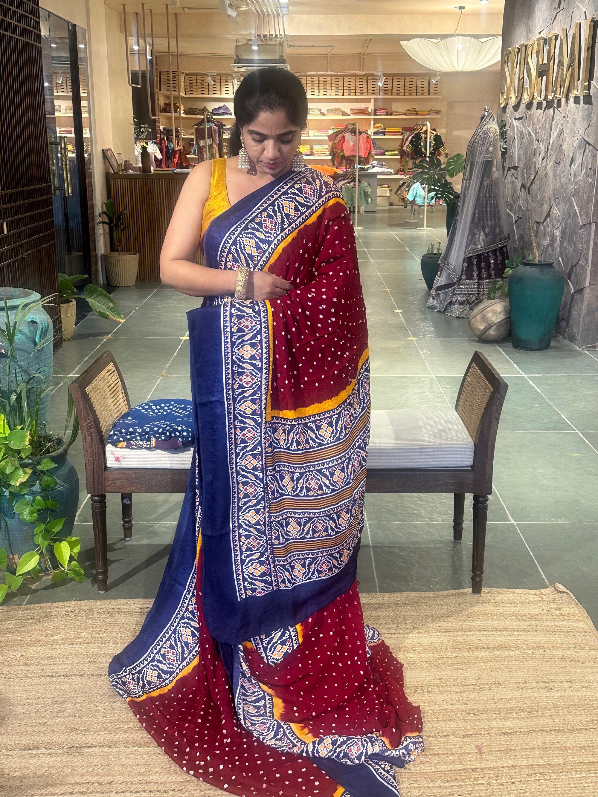 Modal satin Bandhej saree with patola printed border and pallu