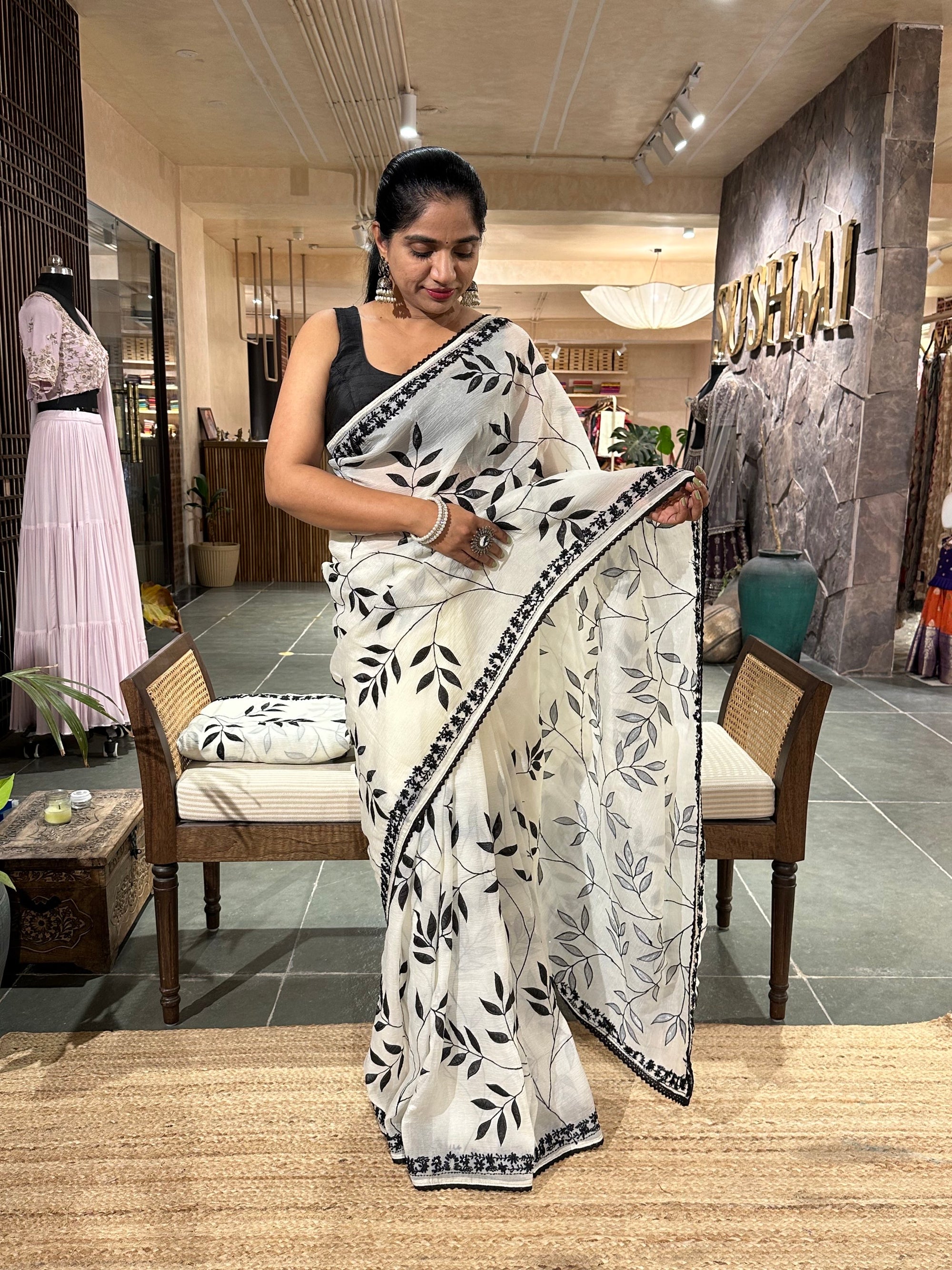 Half white crush Saree with allover applique work in leaf creeper pattern  and h