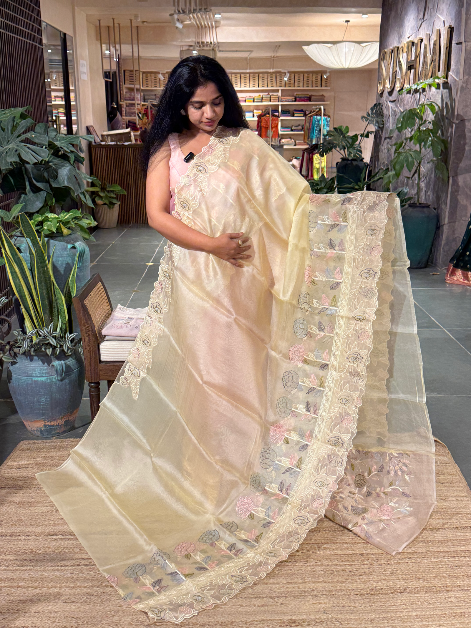 Pastel Yellow Pure Organza Saree with embroidered and cutwork borders