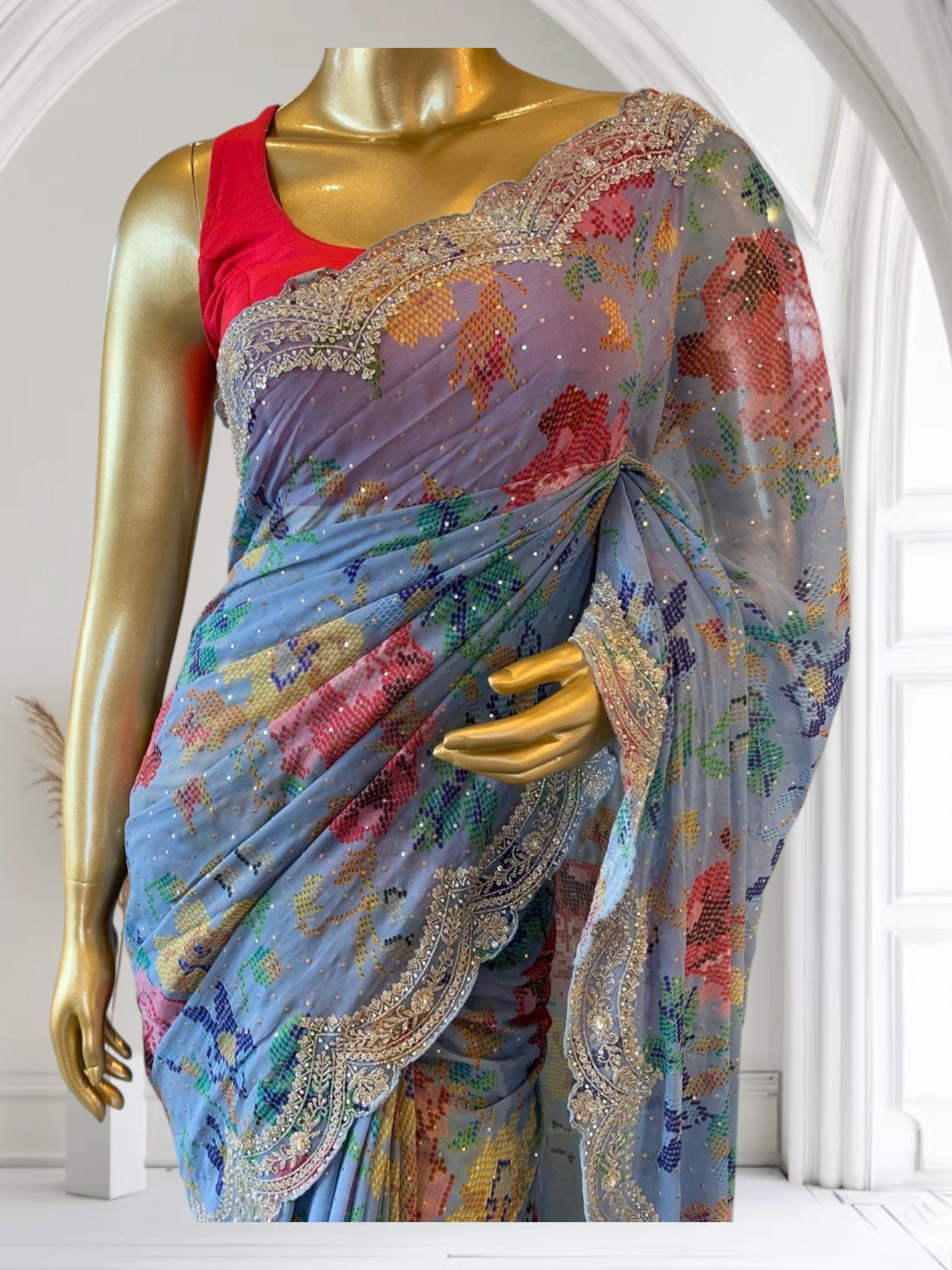Blue Gorgette printed Saree  with handwork borders