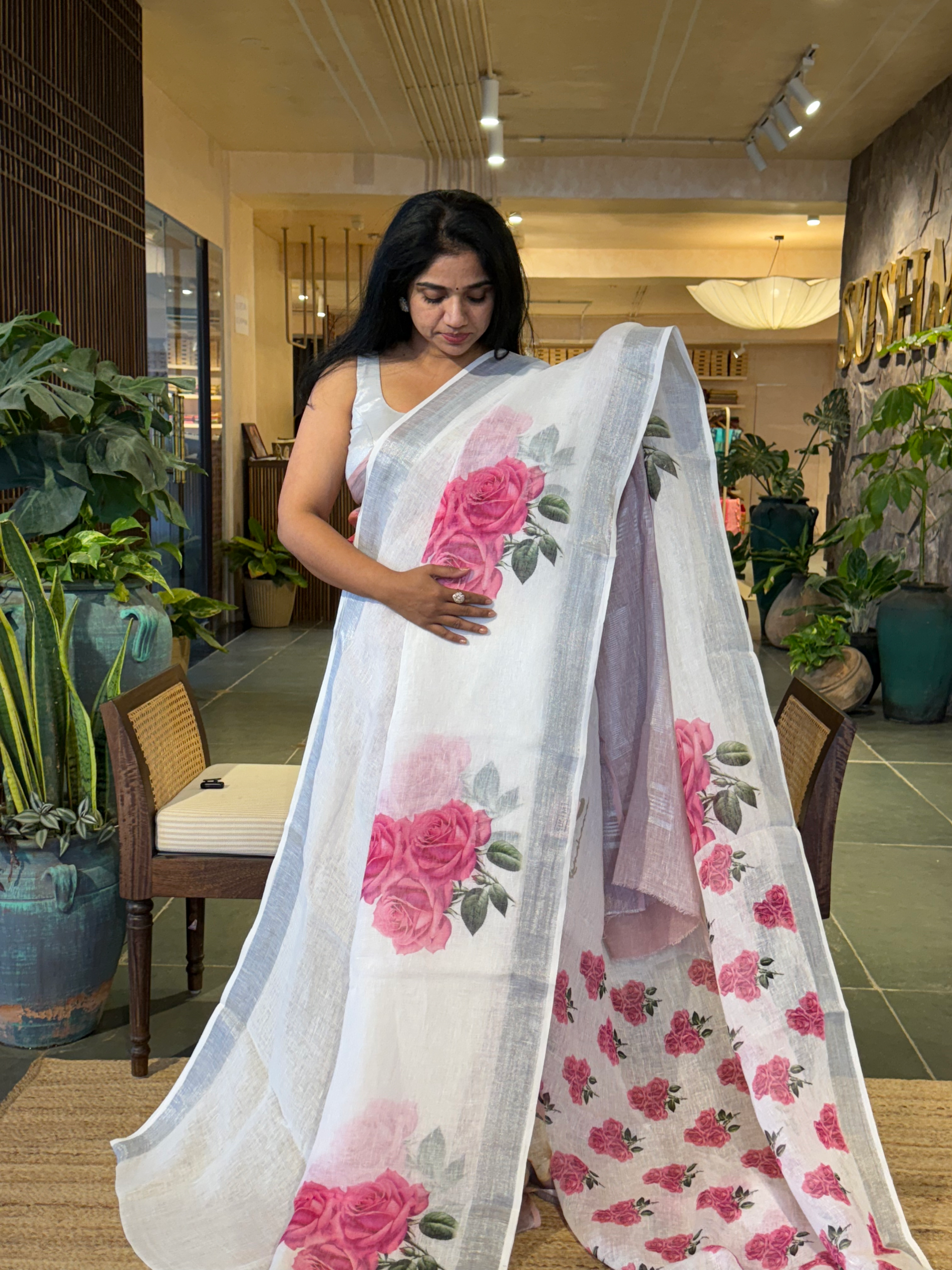Snow White Pure Handloom Lenin Saree With  Statement Rose Bunch  Print