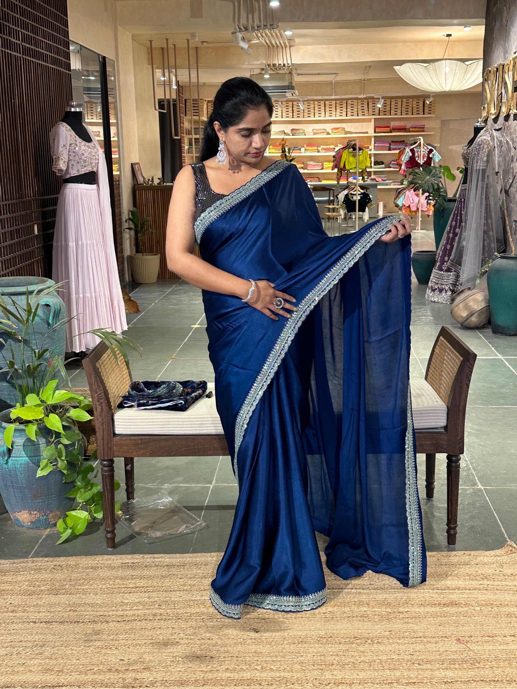 Pure Chinnon Satin Silk Saree with sabyasachi borders paired with velvet blouse