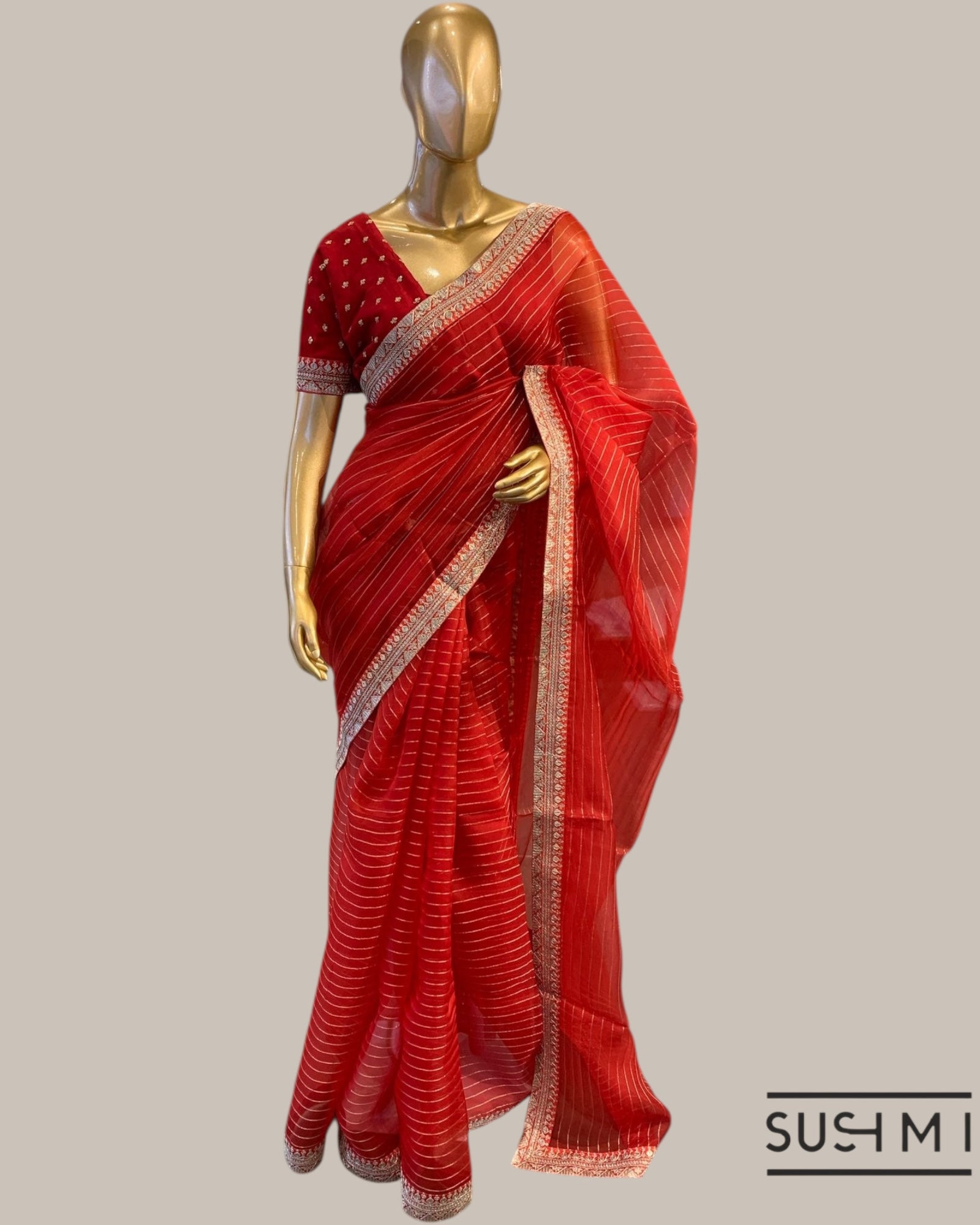 Red Organza Saree with Zari stripes Hemlined with sabhyasachi border and blouse