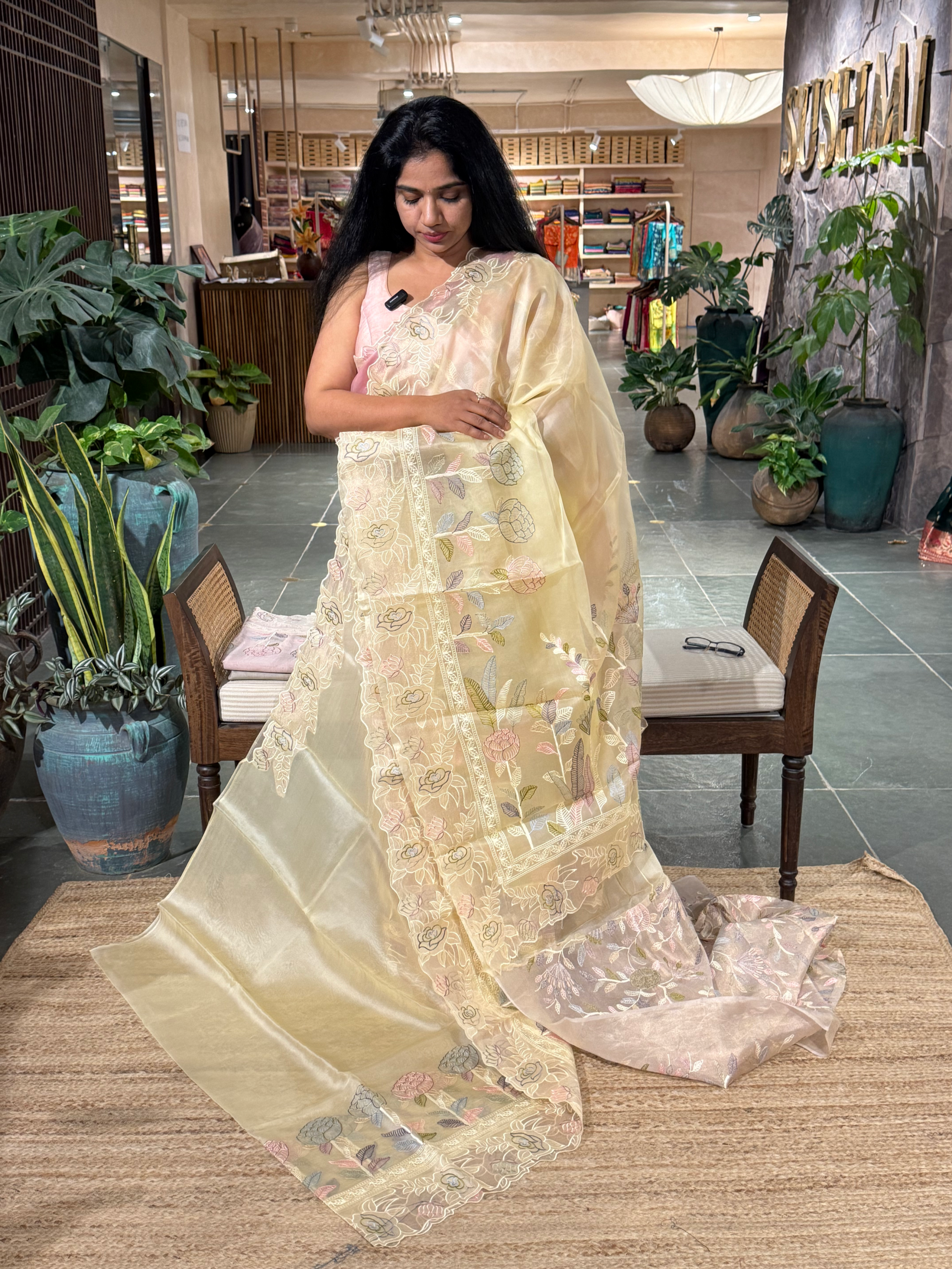 Pastel Yellow Pure Organza Saree with embroidered and cutwork borders