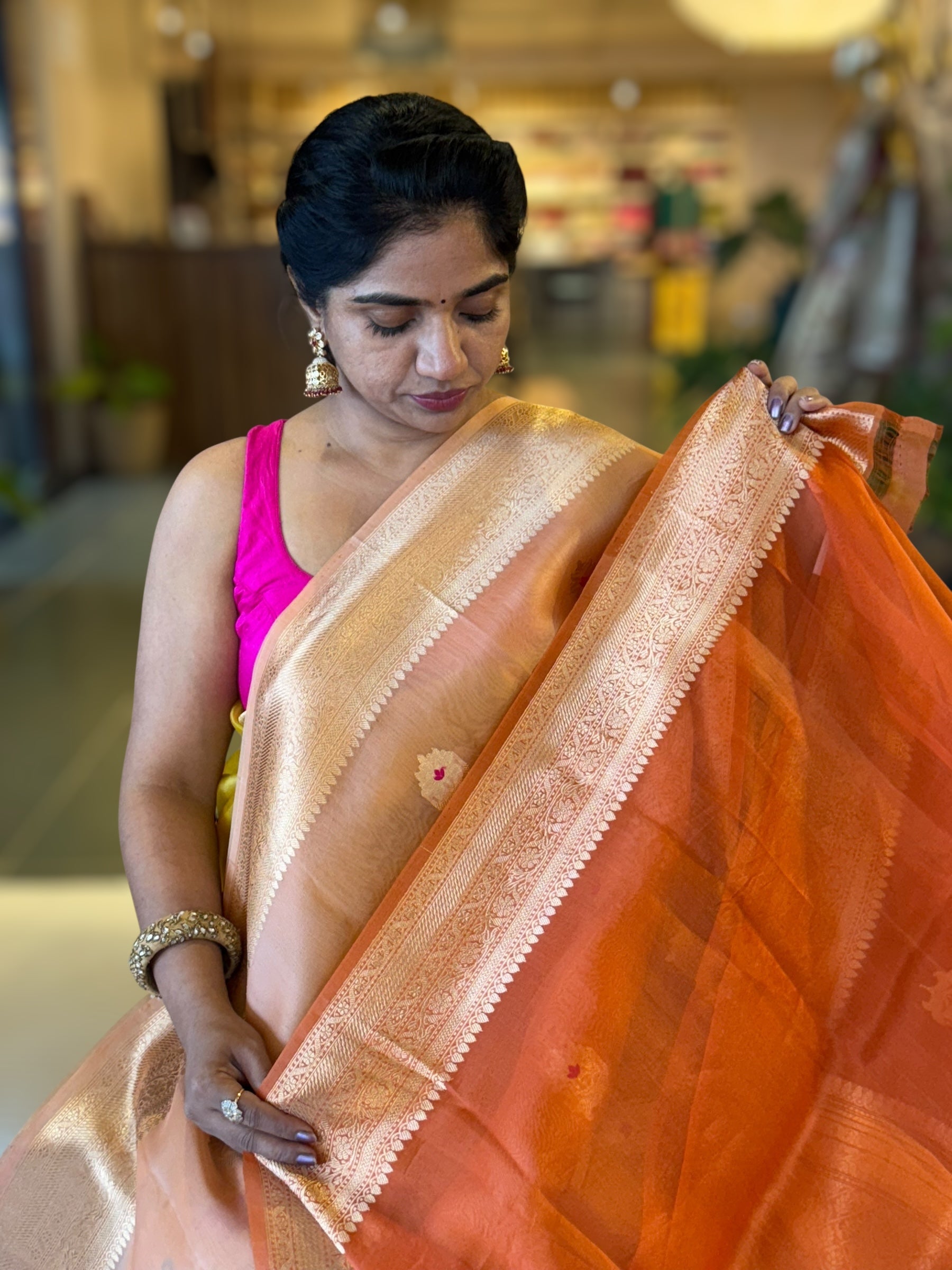 Rust Shaded Premium Kora Banarasi Saree with Allover Meenakari Kaduwa Motifs