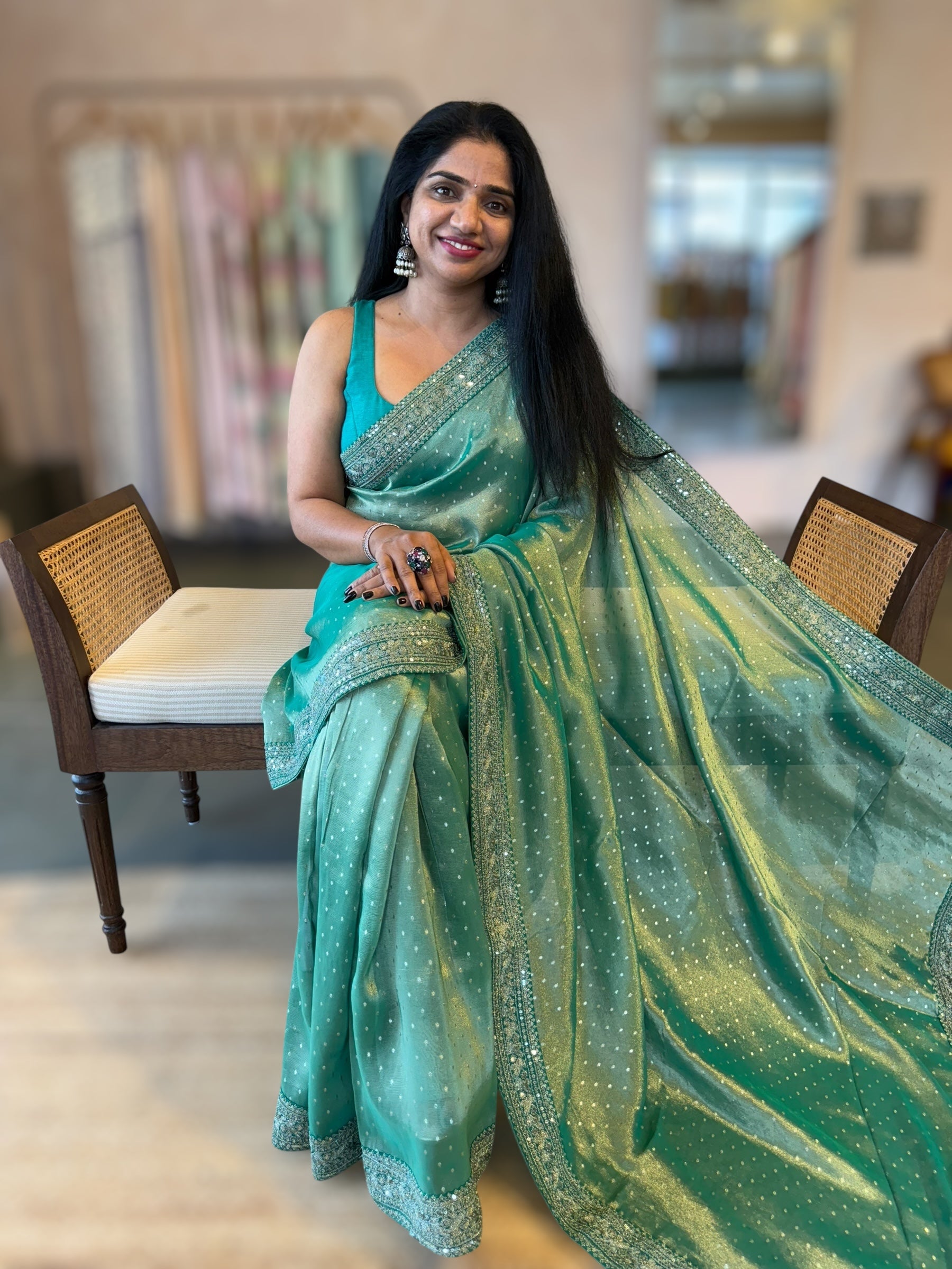 Teal Tissue Gorgette saree with sabyasachi borders and allover pitawork blouse