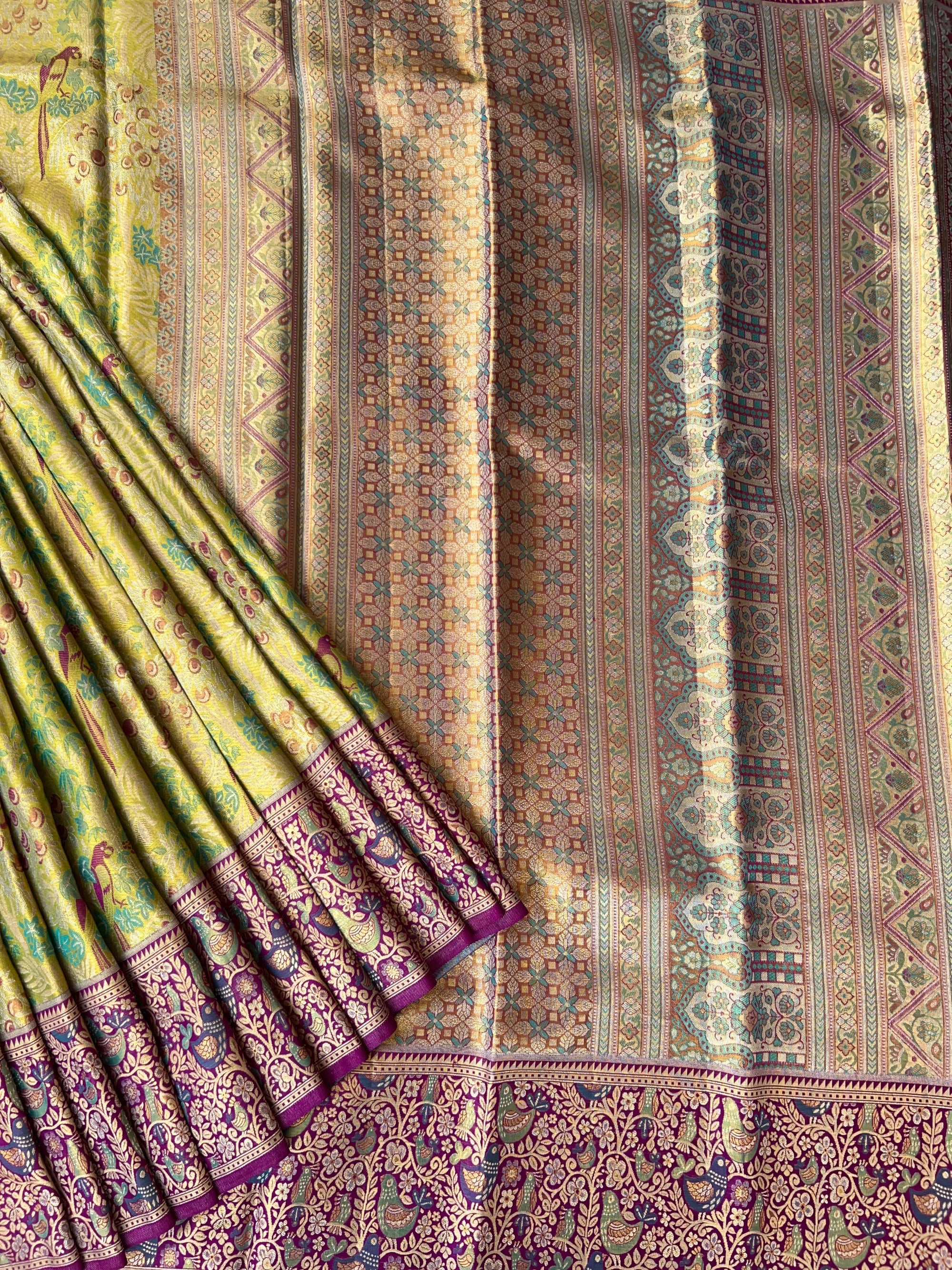 Lime Green Tissue Kanchi Pattu Saree with Meenakari Parrot Motifs