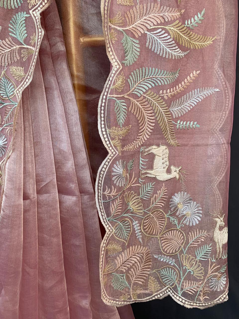 Baby Pink Tissue Designer Saree with by heavy embroidered Borders  .