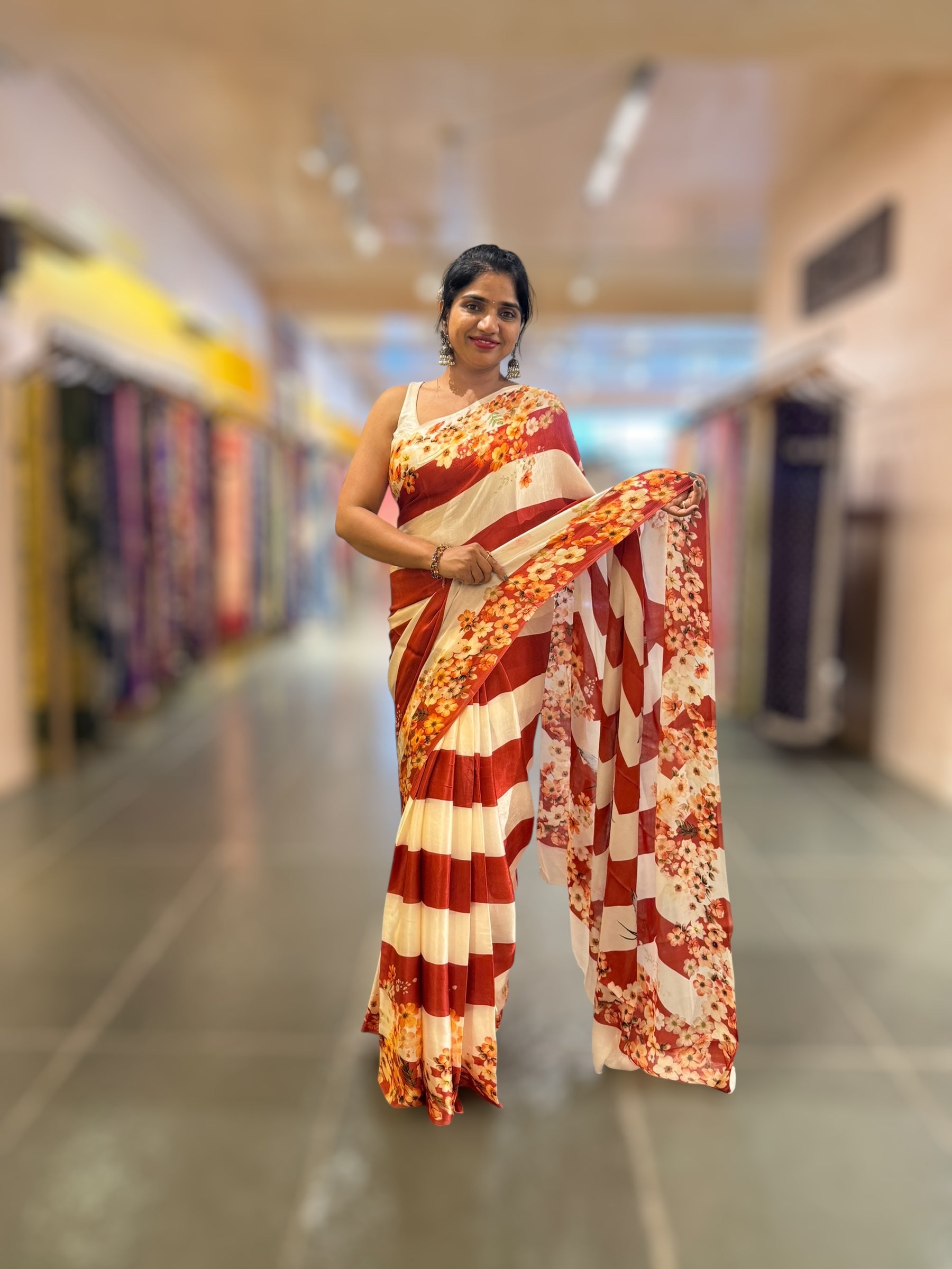 Trisha inspired Chinnon Silk Stripes & Floral Printed Saree
