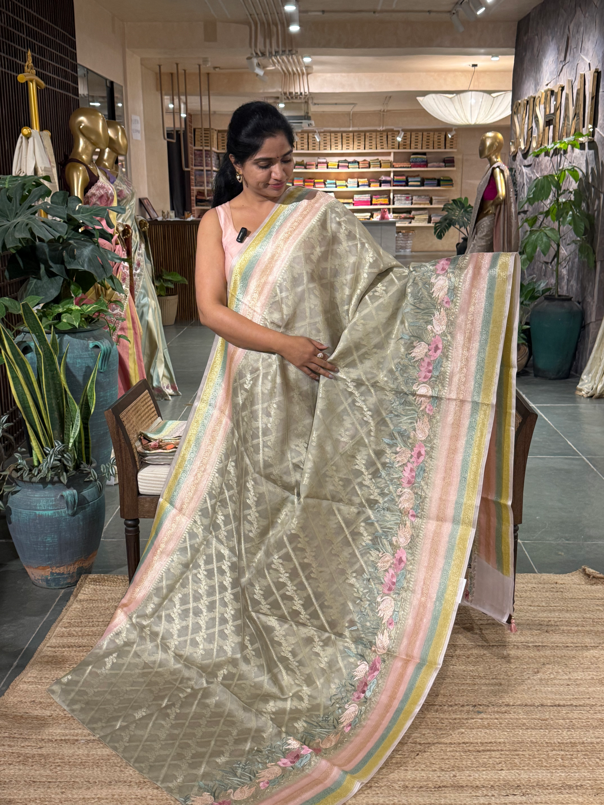 Pure Handloom Kora Banarasi with rangkaat and embroidered borders and blouse.