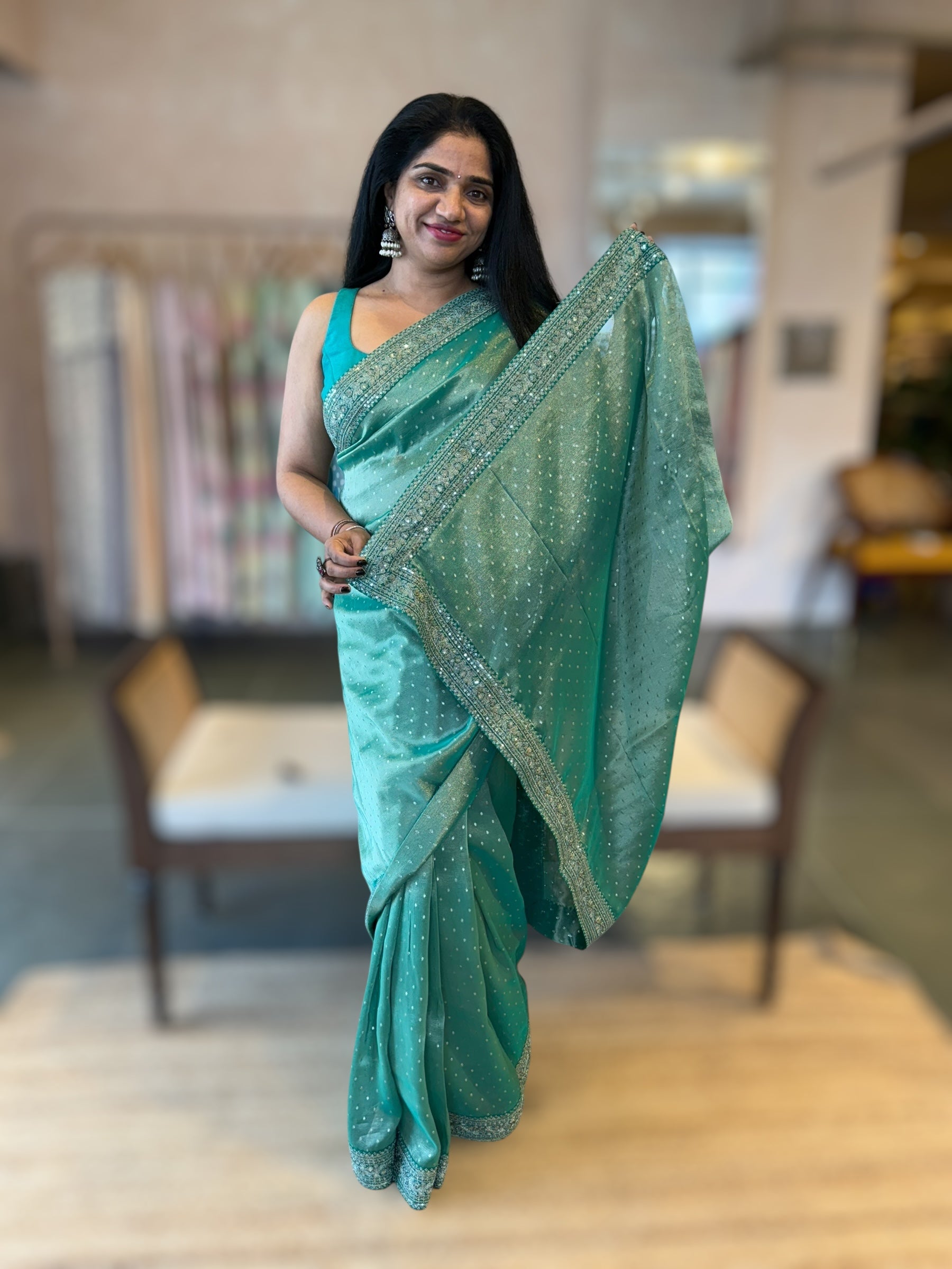 Teal Tissue Gorgette saree with sabyasachi borders and allover pitawork blouse