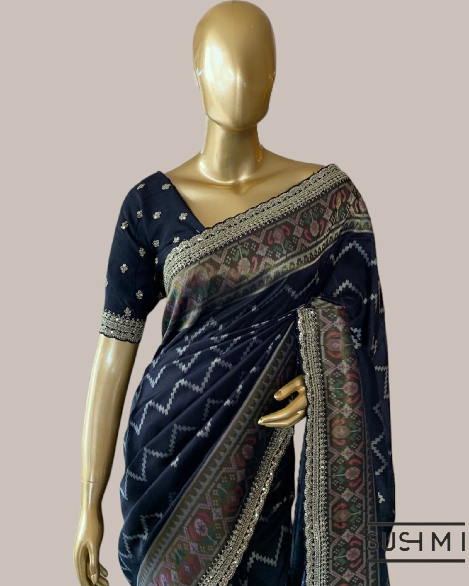 Black Falling Tussar Silk Gorgette Saree in Ikkath Patola style Chevron body and