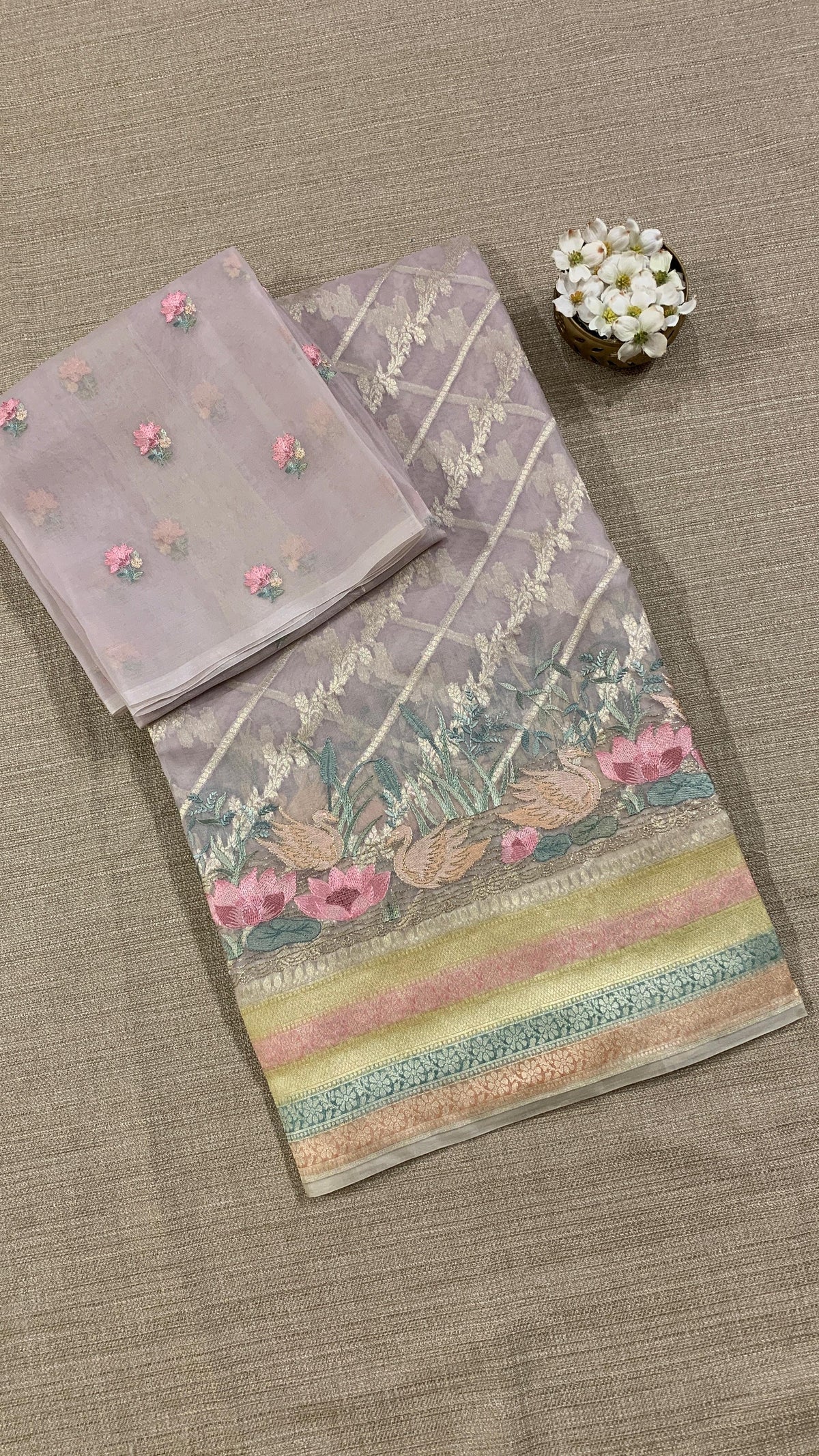 Pure Handloom Kora Banarasi with rangkaat and embroidered borders and blouse.