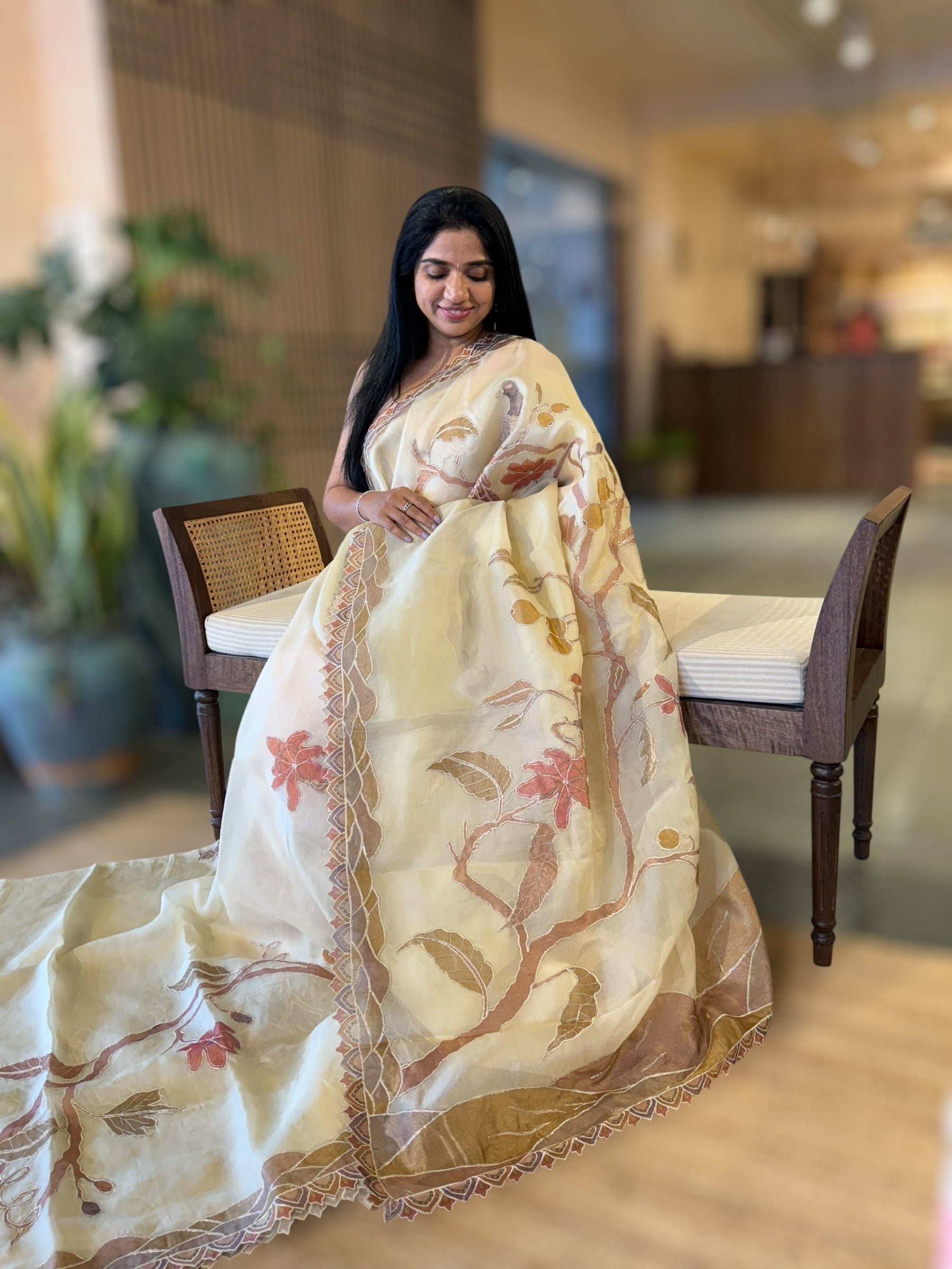Pastel Yellow Pure Organza Saree with one of a kind Tissue Applique work allover