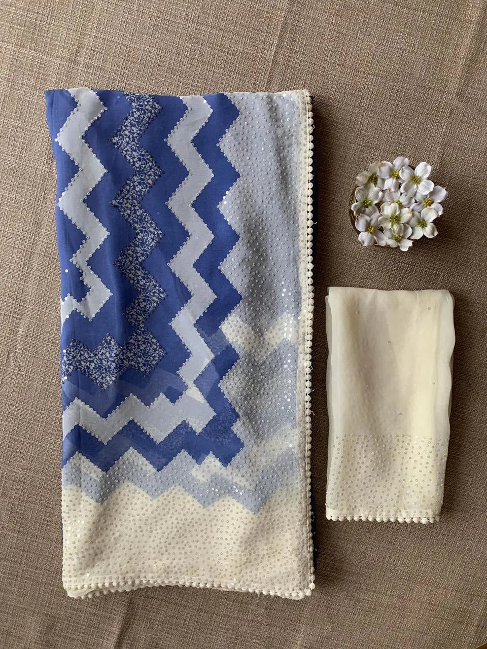 Blue Pure Gorgette Saree With Zigzag Pattern Sequnce Border