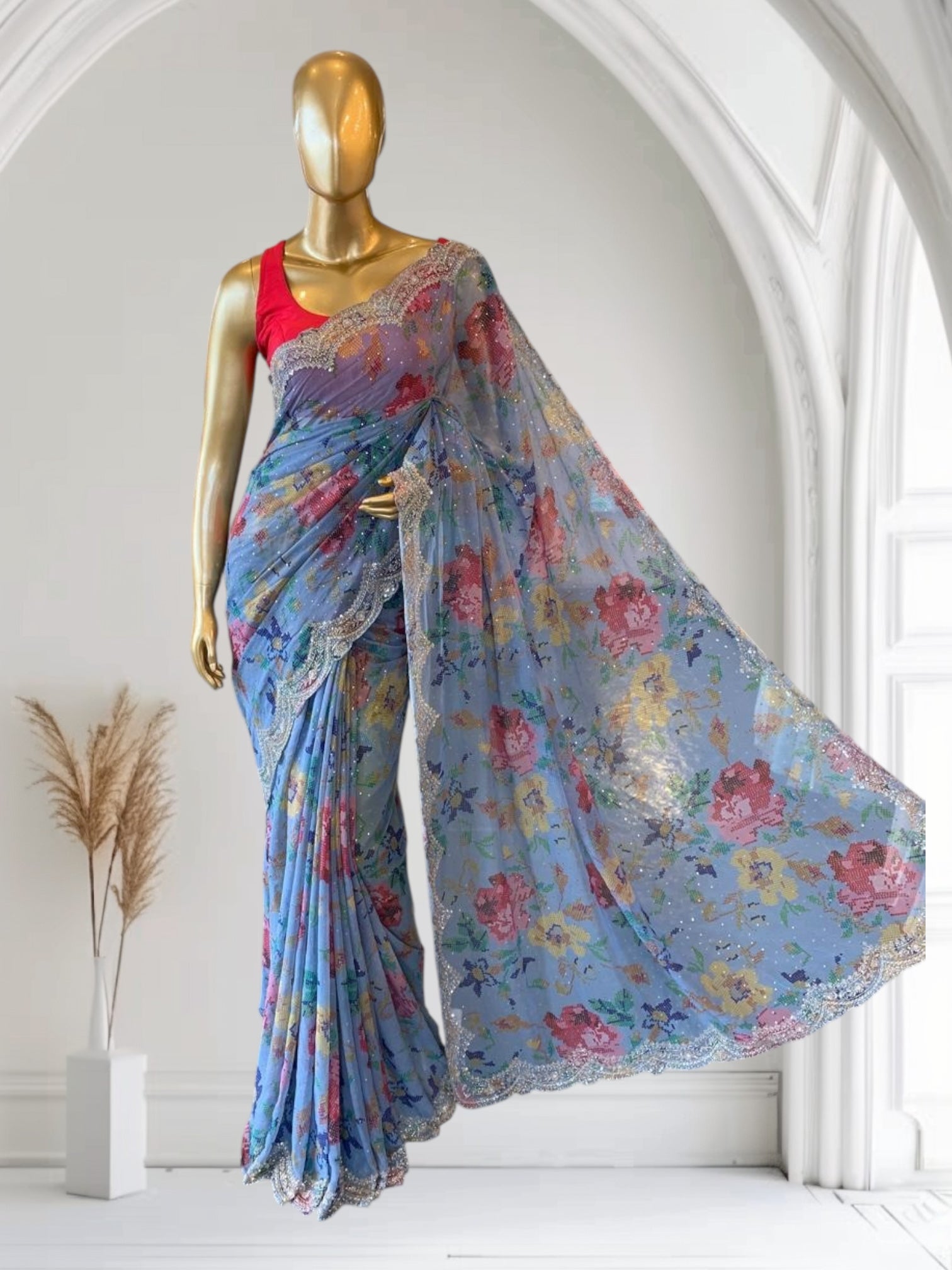 Blue Gorgette printed Saree  with handwork borders