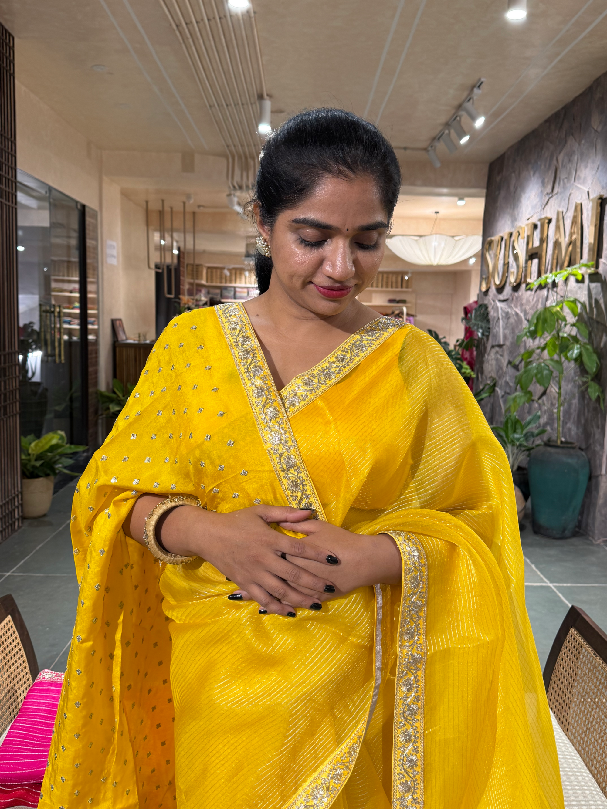 SOSSM2901 Yellow Organza Saree hemlined with Sabhyasachi Borders
