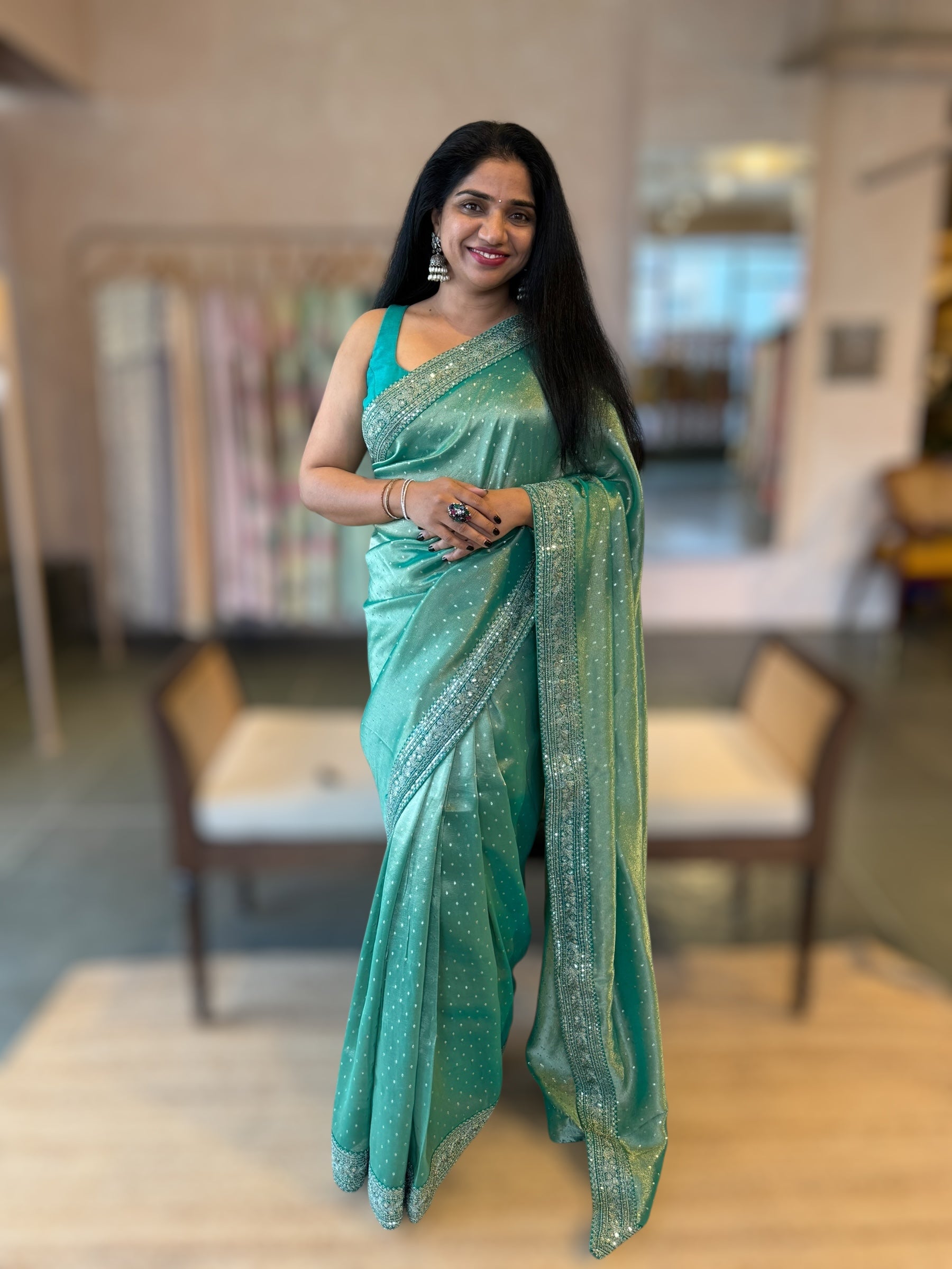 Teal Tissue Gorgette saree with sabyasachi borders and allover pitawork blouse