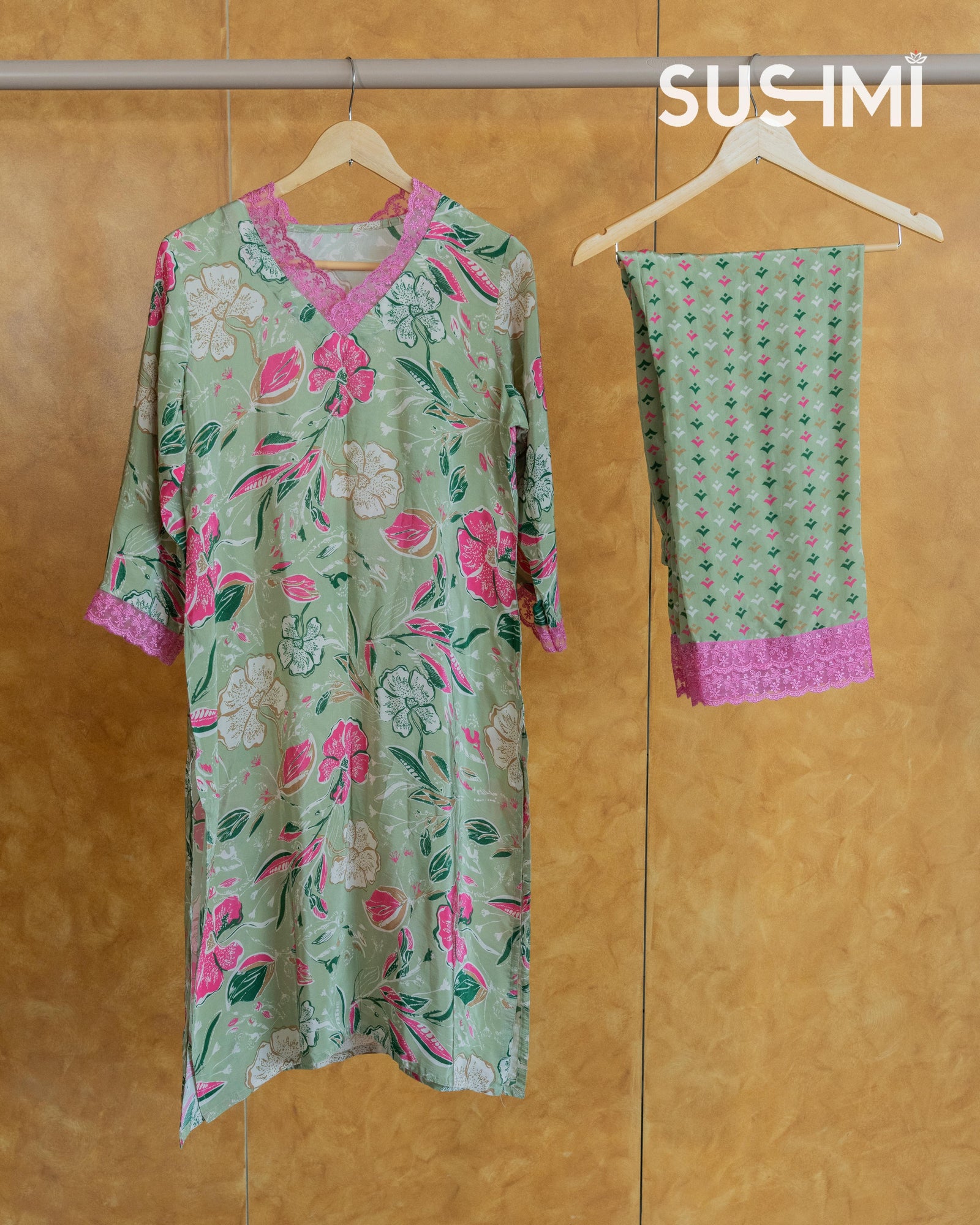 Floral printed coordset with lace hemline for neck and sleeves .Bottom is also p