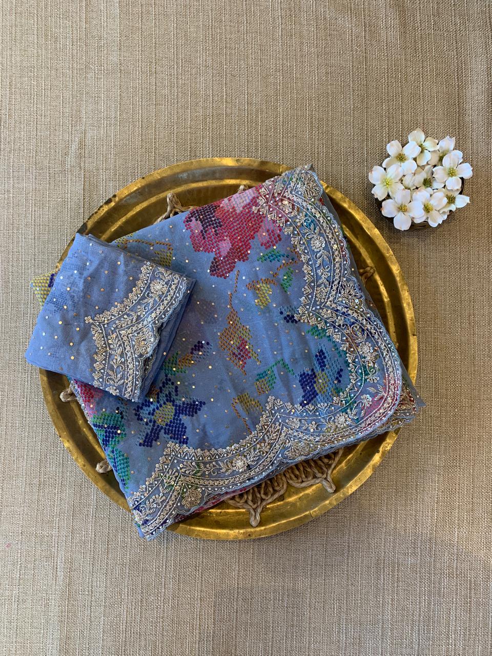 Blue Gorgette printed Saree  with handwork borders