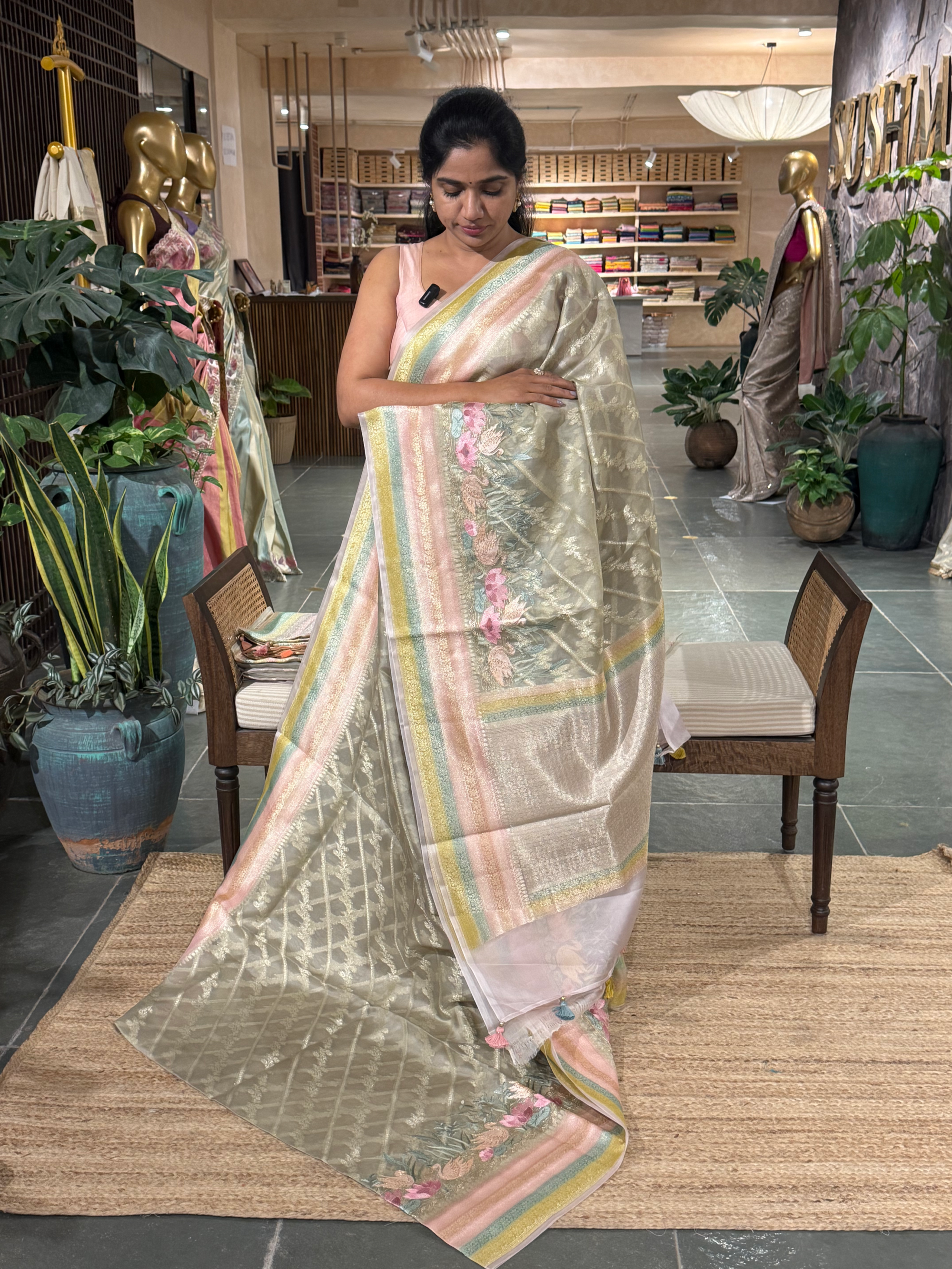Pure Handloom Kora Banarasi with rangkaat and embroidered borders and blouse.