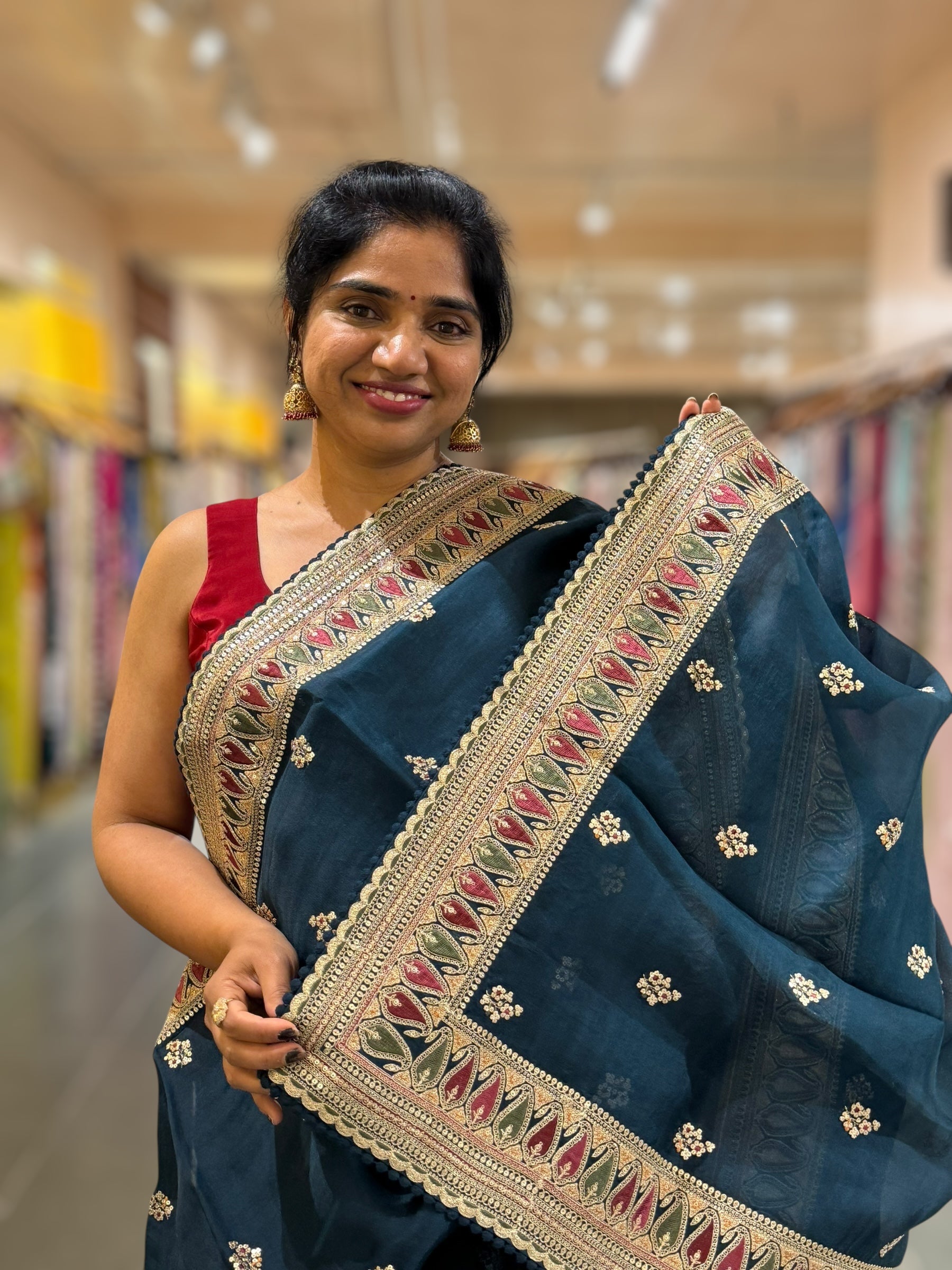 Luxe Peacock Blue Organza Saree with Sabyasachi-Inspired Border & Blouse