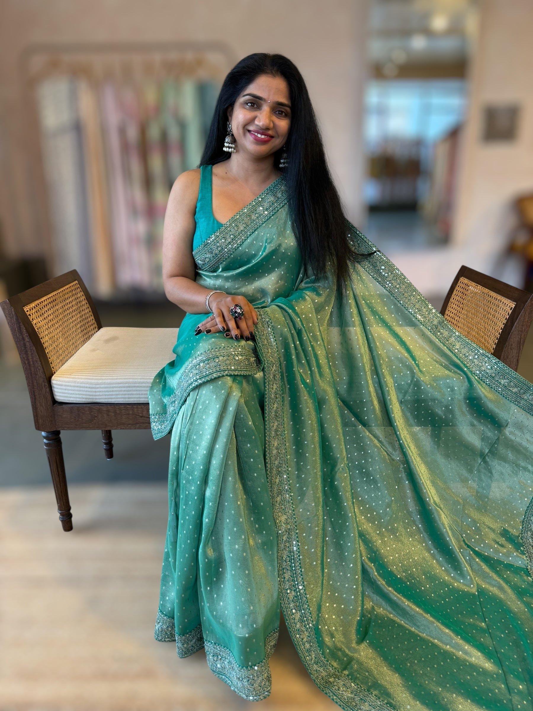 Teal Tissue Gorgette saree with sabyasachi borders and allover pitawork blouse