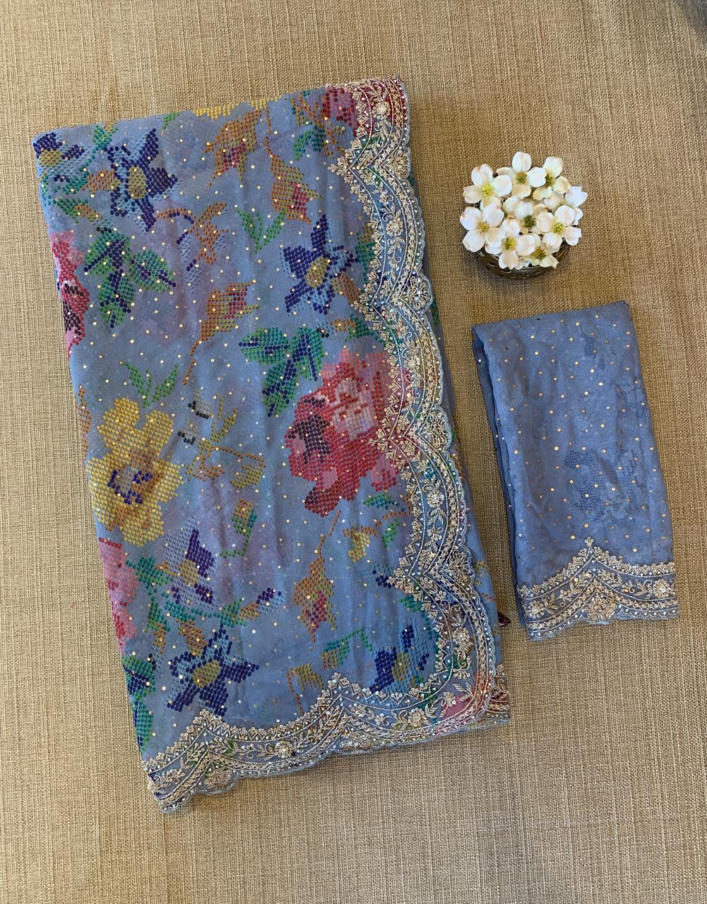 Blue Gorgette printed Saree  with handwork borders