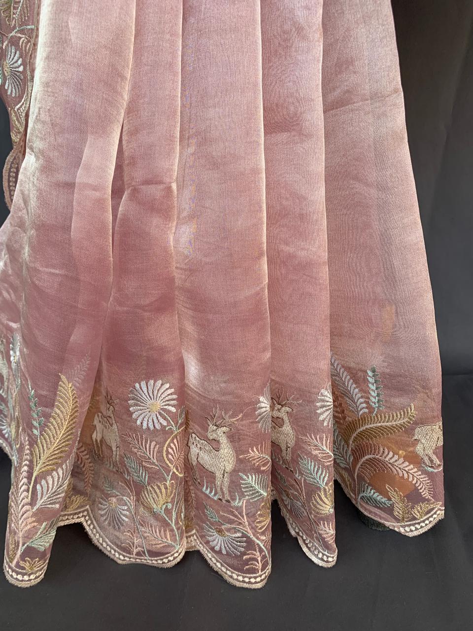 Baby Pink Tissue Designer Saree with by heavy embroidered Borders  .