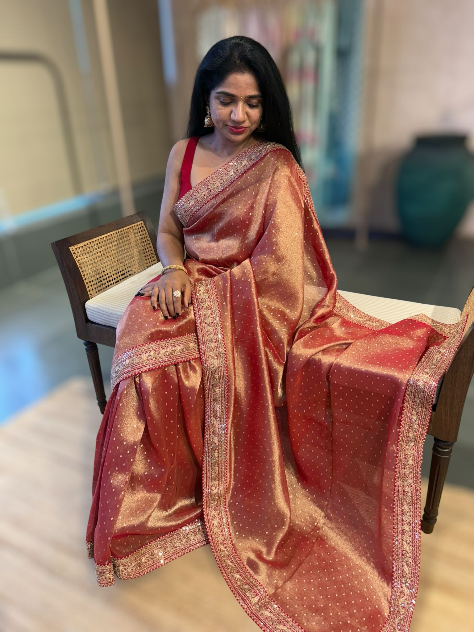 Red Tissue Gorgette saree witj sabyasachi borders and allover pitawork blouse