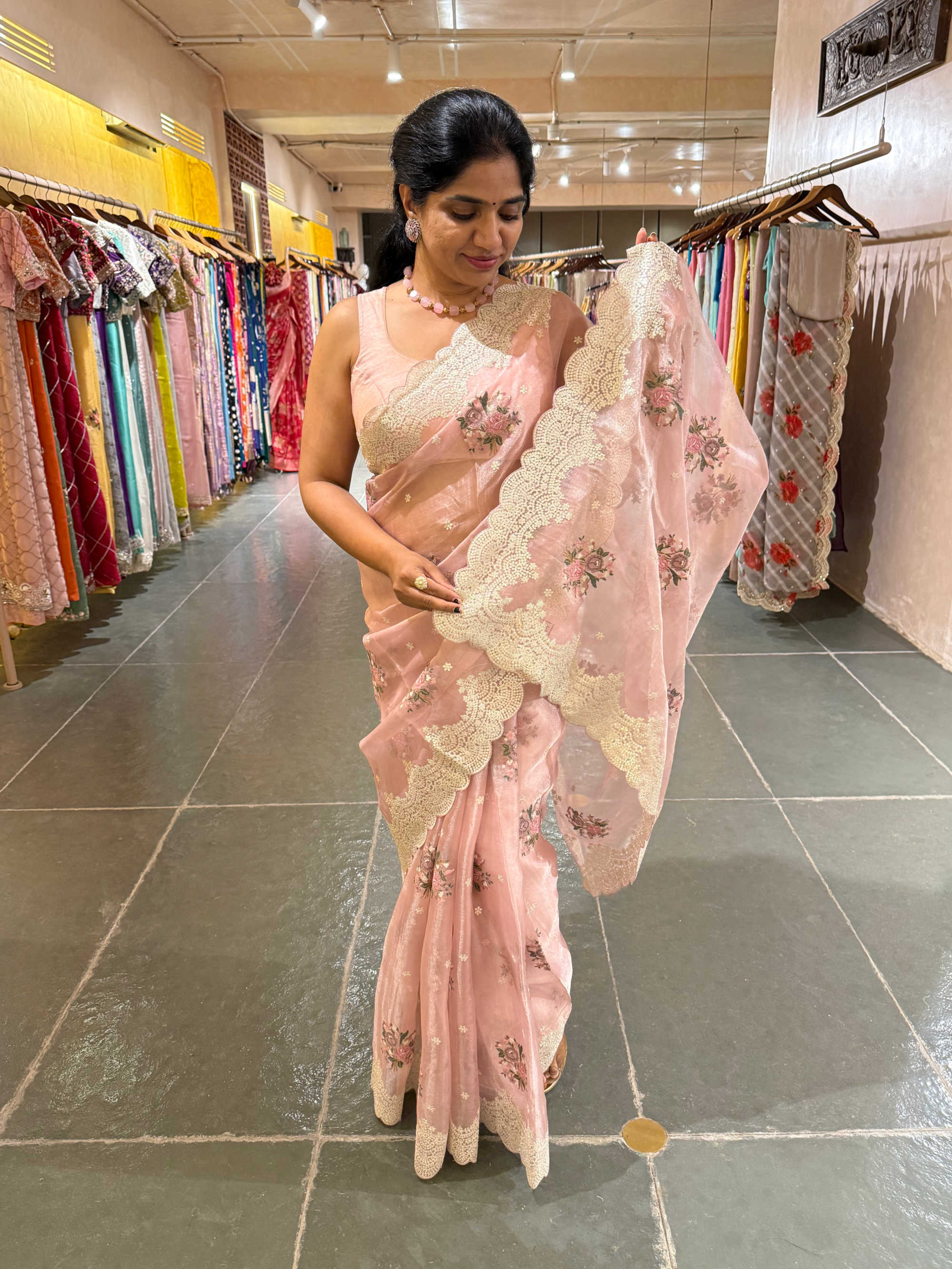 Pink Tissue Saree With allover Petite Point Motifs & Pittai Sequnce Borders
